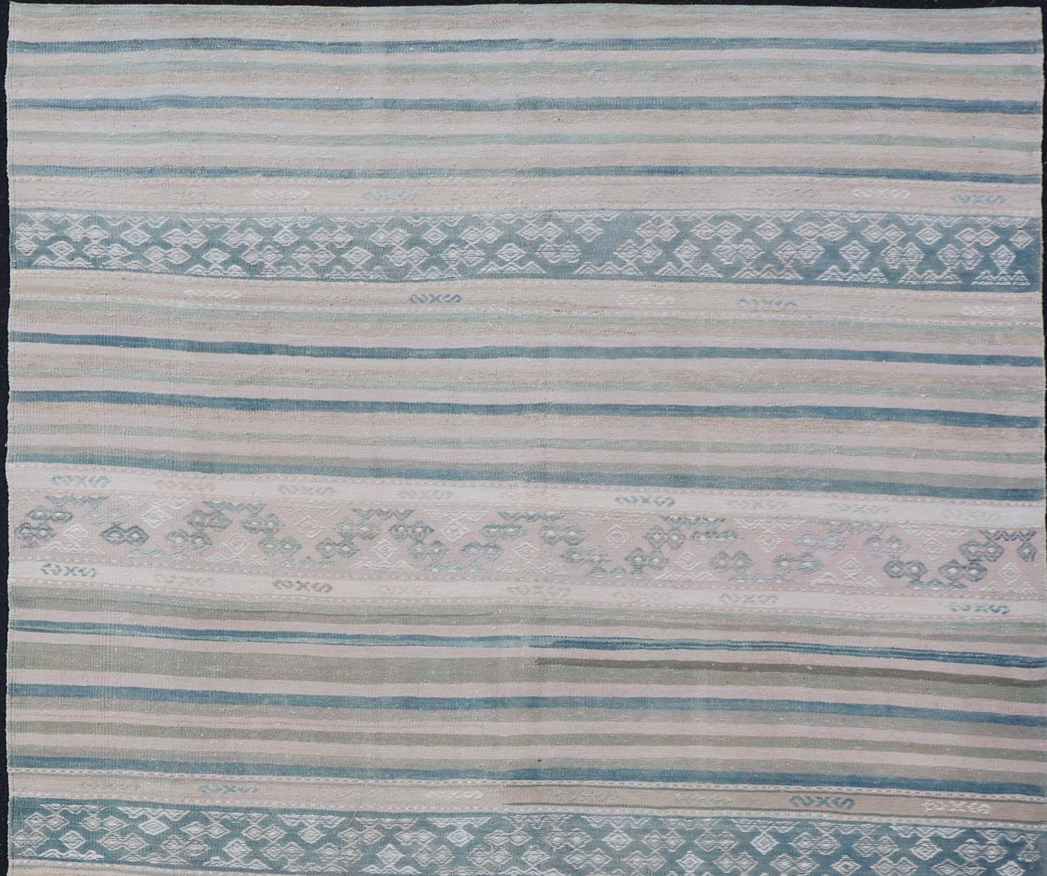        Vintage Flat-Weave Kilim with Embroideries in Blush, Green, Blue and Gray

Vintage flat-weave Kilim with embroideries in blush, green, blue and gray with a modern design
geometric stripe design Vintage Kilim from Turkey, Keivan Woven