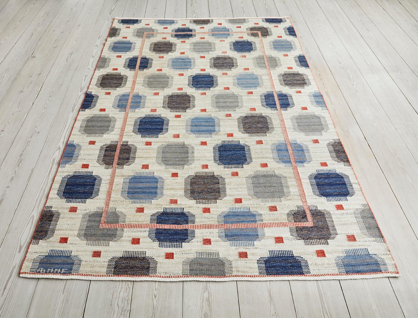 Märta Måås-Fjetterström
Sweden, 1937

“Blåplump” rug. Handwoven wool in cream with blue and red details. Designed in 1937. Handwoven at Märta Måås-Fjetterström AB, Båstad, Sweden.

Märta Måås-Fjetterström (1873-1941), considered to be Sweden’s