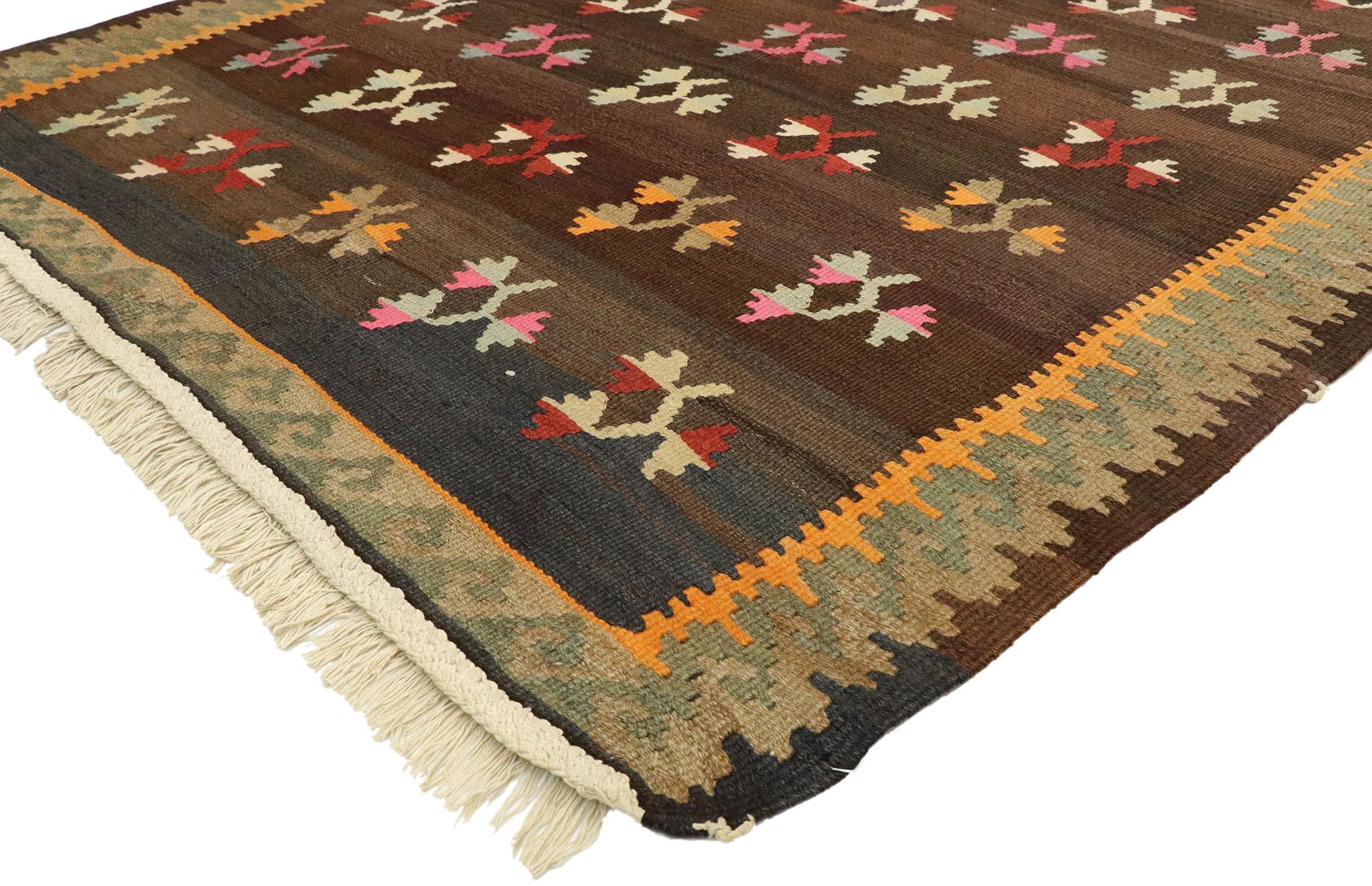 70293, vintage flat-weave Turkish Floral Kilim rug with boho farmhouse style. Bright and versatile, this handwoven wool vintage Turkish floral Kilim rug beautifully embodies a boho farmhouse style. The abrashed dark brown abrashed field features an