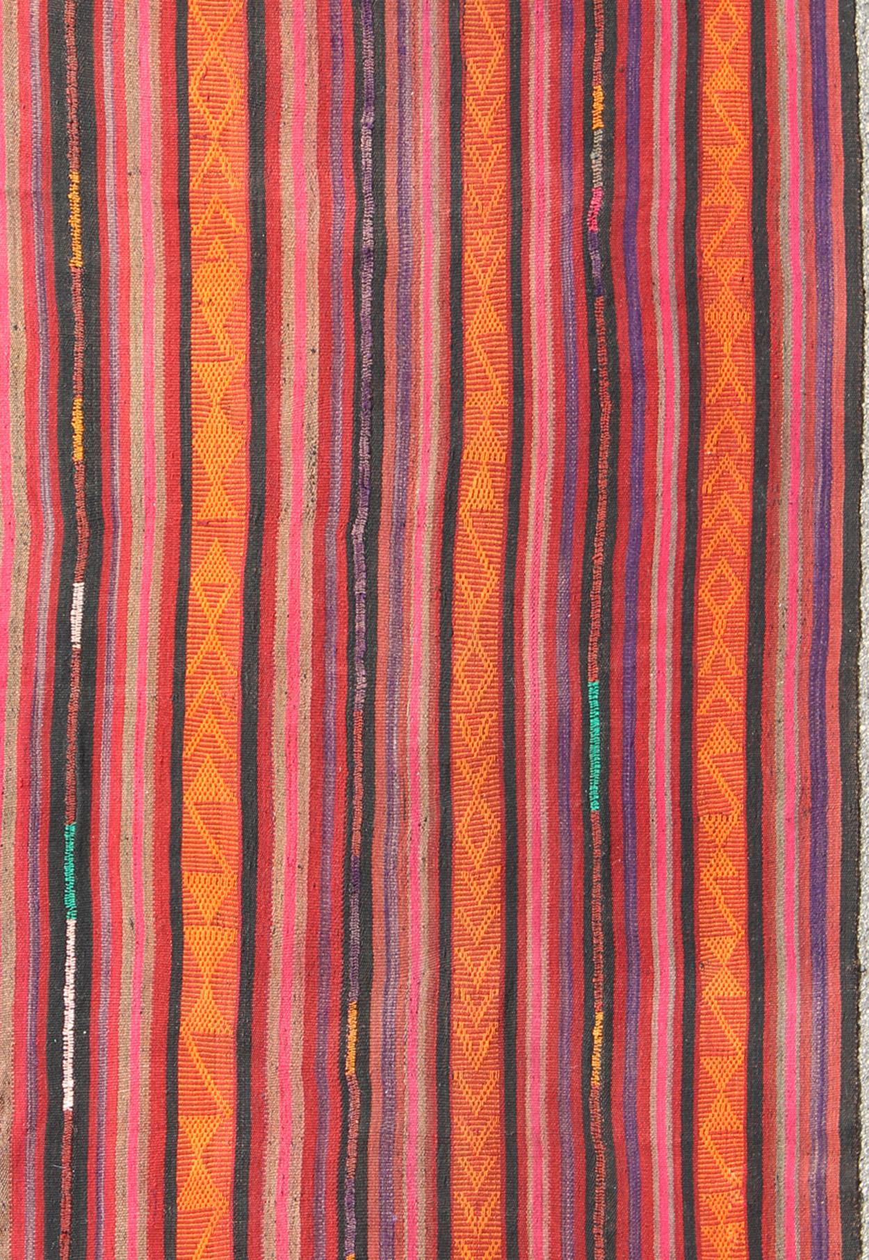 Kilim vintage rug from Turkey with striped pattern, rug Tu-Ned-4733, country of origin / type: Turkey / Kilim, circa 1940

This tribal Kilim from Turkey bears vertical striped design.
Measures: 6'5 x 10'5.