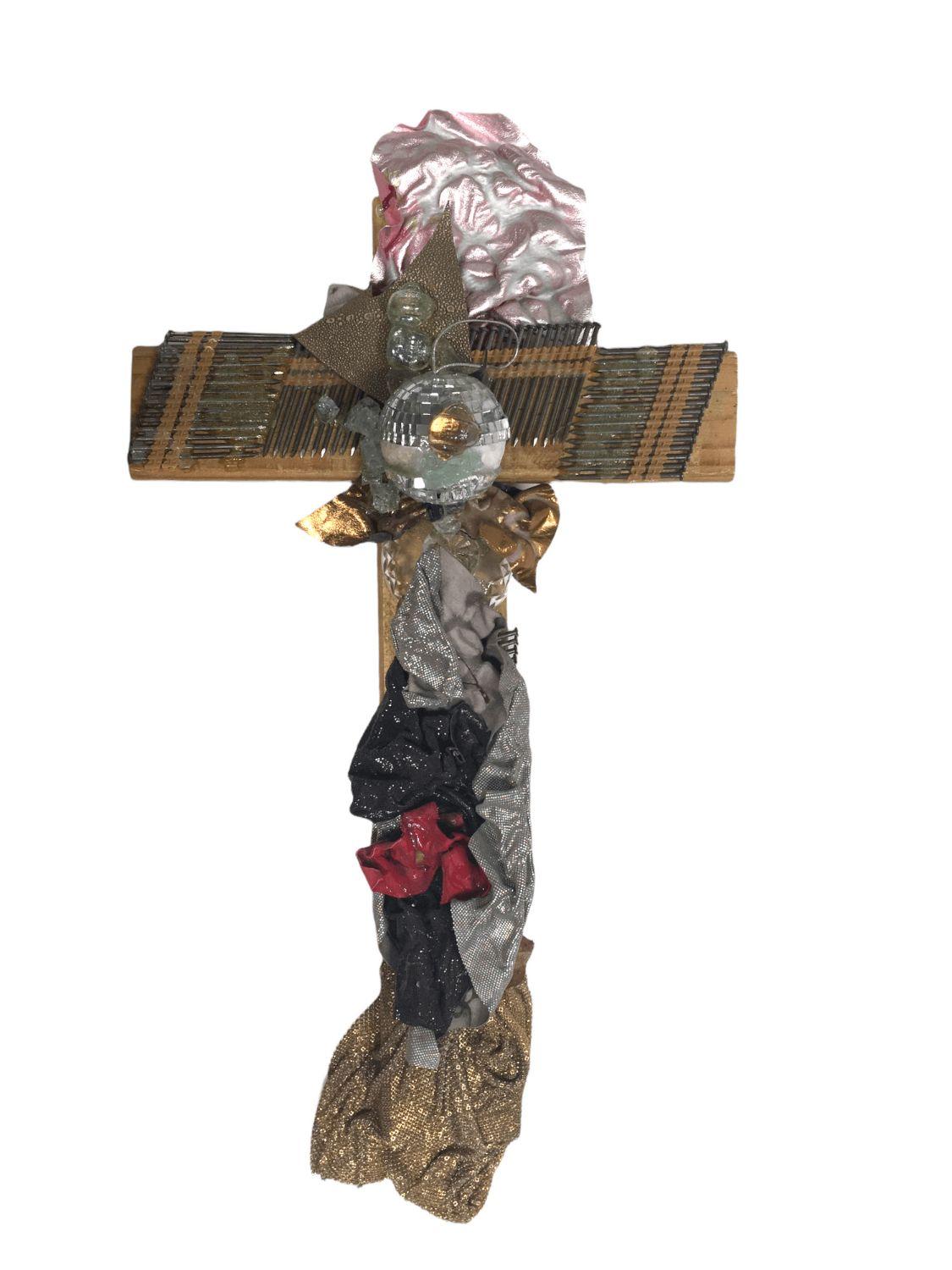 Vintage Flat Wood Cross with Mixed Media Decorations. $885
 
This unique cross made of 2 solid pieces of flat wood has been decorated with nails, fabric, metal net and glass, in a display of mixed media technique and using a muted palette of colors.