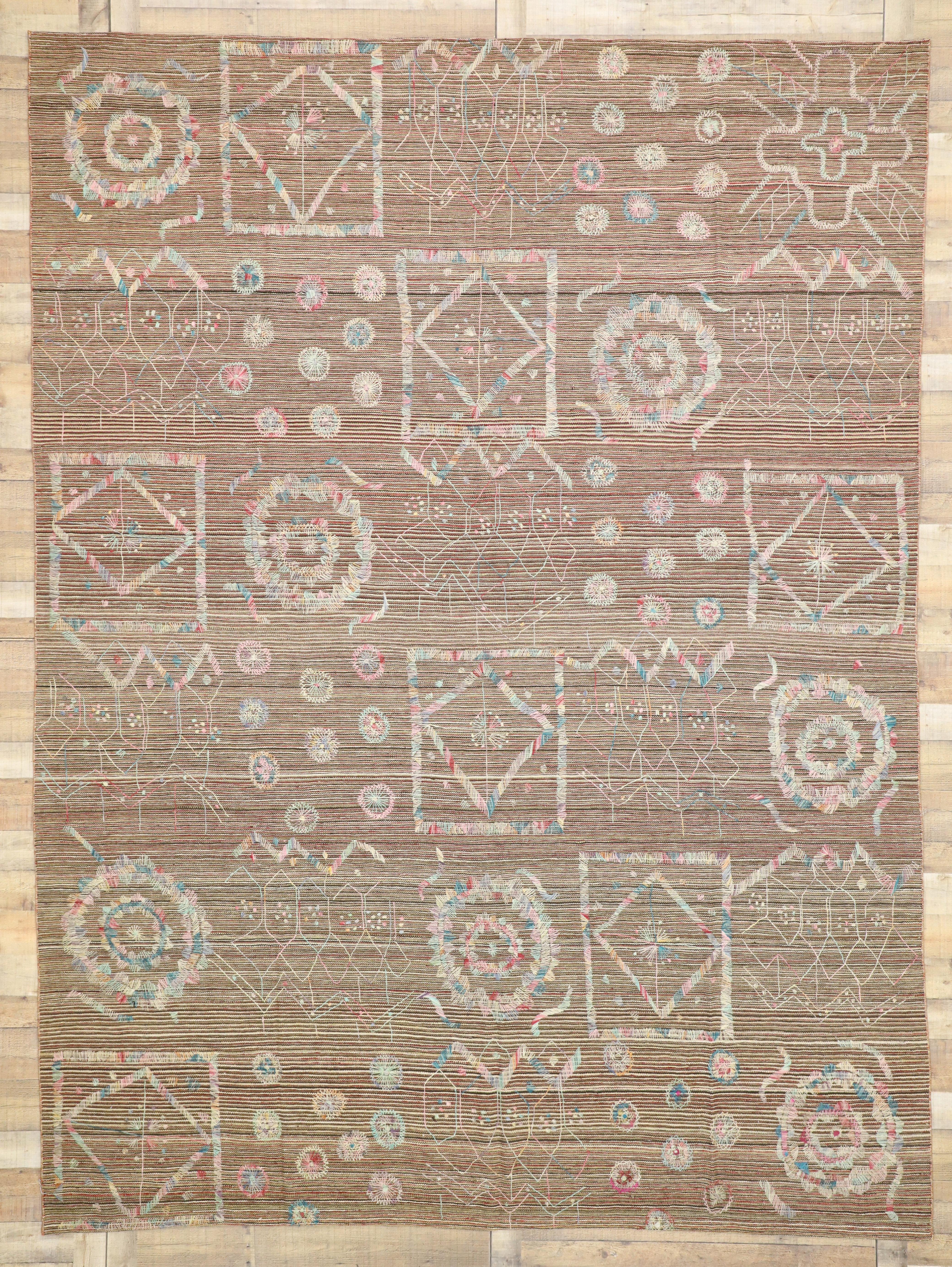 80101 Vintage Flatweave Kilim Rug with Embroidered Suzani Design in Soft Pastel Colors. This specific vintage Kilim is very rare due to the suzani design, a type of embroidered and decorative tribal textile. The rug displays a beautiful geometric