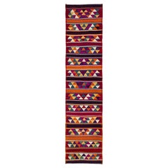 Tappeto vintage a trama piatta in lana turca Kilim con disegno geometrico multicolore