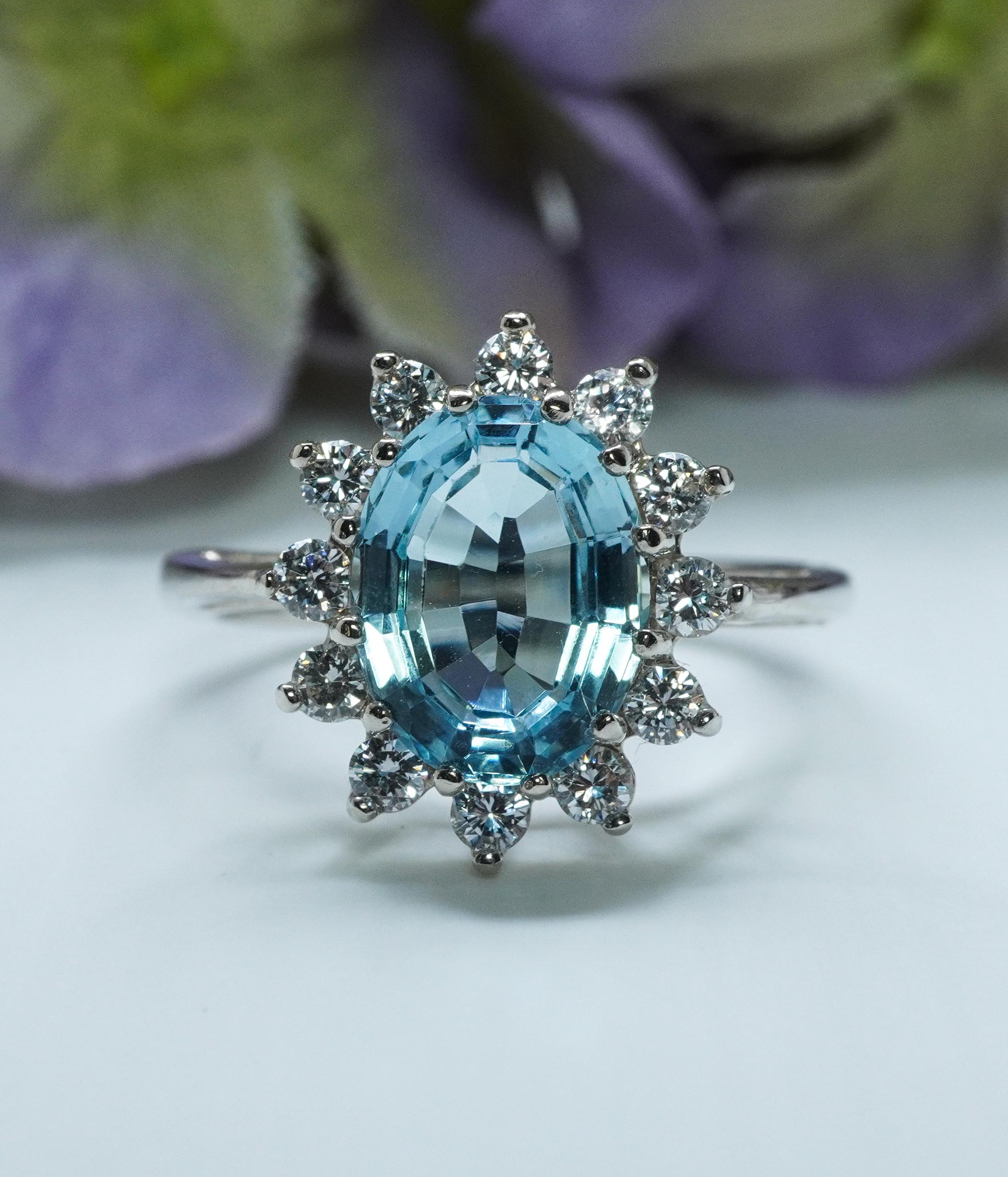  Vintage Flawless Aquamarine Master cut Diamond Halo Ring 14K White Gold Estate  

What a great ring. It has it all, a sparkling aquamarine and fiery diamonds set in a beautiful mounting. It is a fine piece of estate jewelry crafted in luxurious 14K