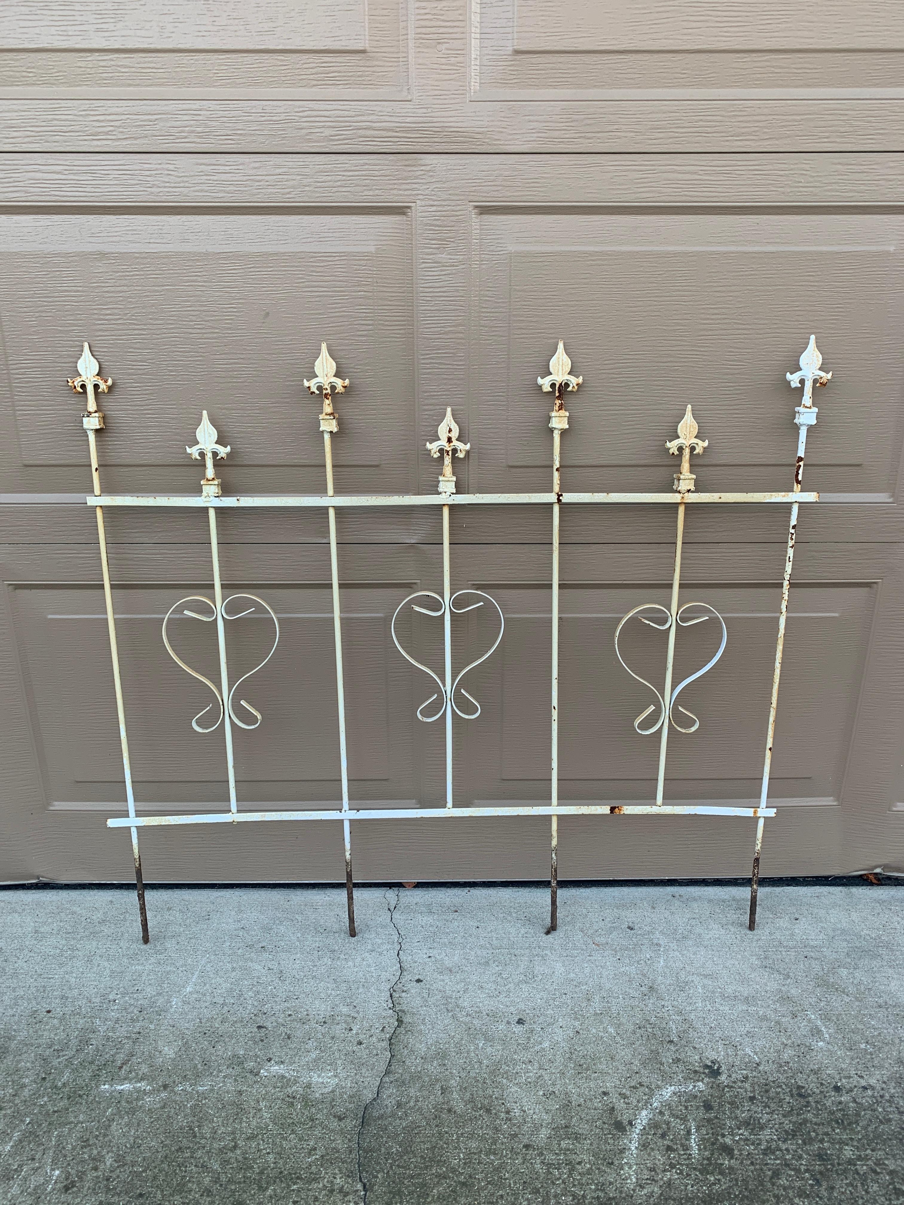 A beautiful French country vintage iron garden trellis with Fleur de lis. This piece will add charm to your country house garden.

USA, Late 20th Century

Measures: 38.5
