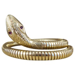 Vintage Flexible Snake Bangle Bracelet in 9 Carat Yellow Gold with Ruby Set Eyes