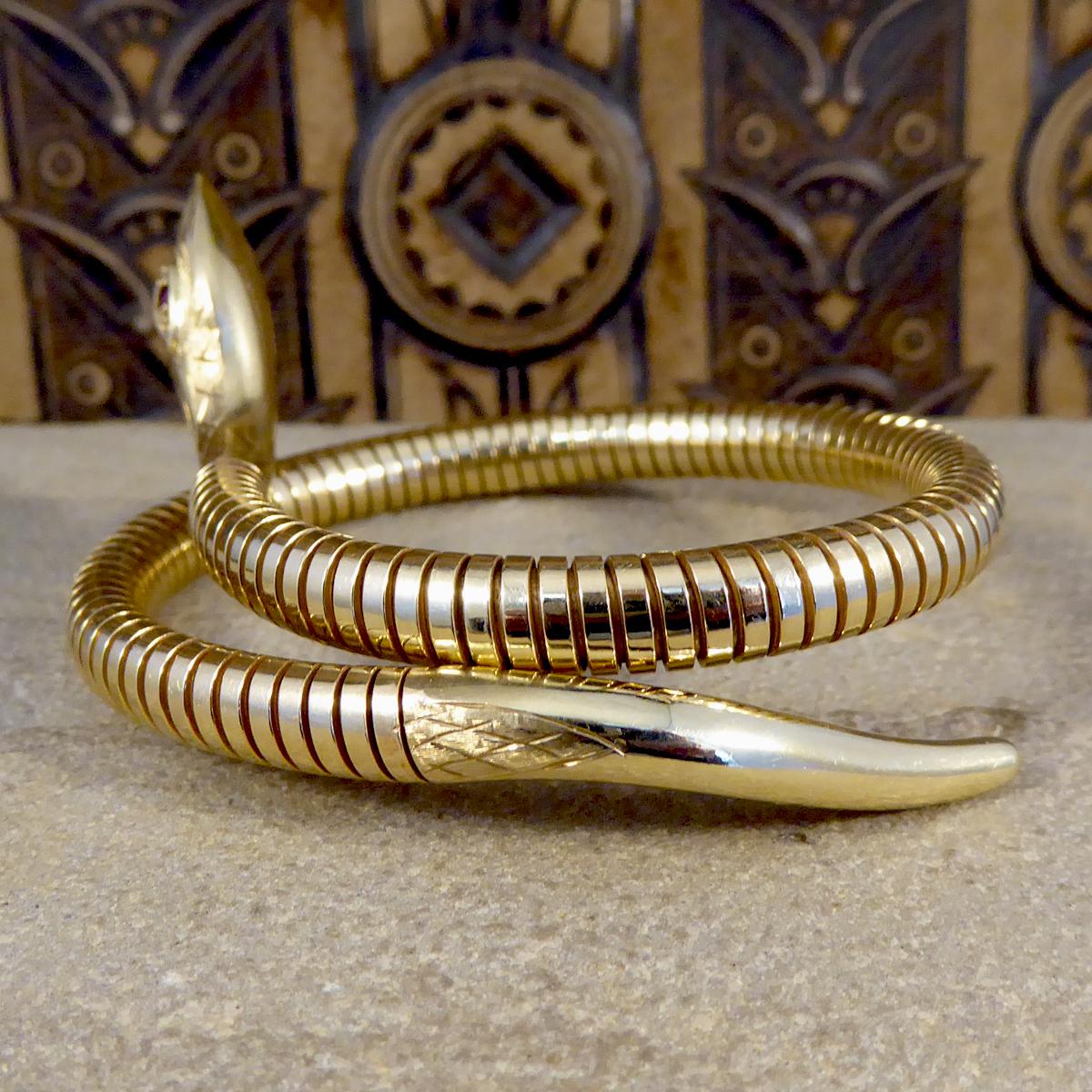 Round Cut Vintage Flexible Snake Bangle Bracelet in 9 Carat Yellow Gold with Ruby Set Eyes