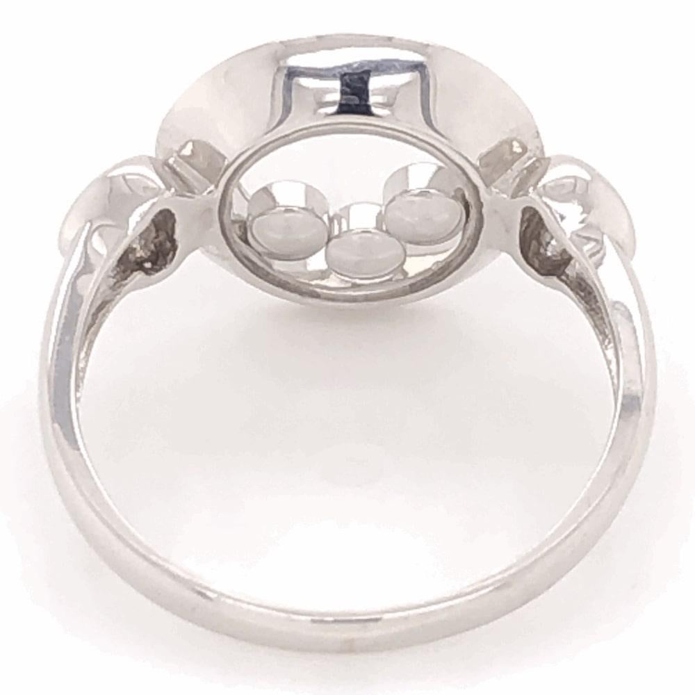 Round Cut Vintage Floating Diamond 18 Karat White Gold Ring Estate Fine Jewelry