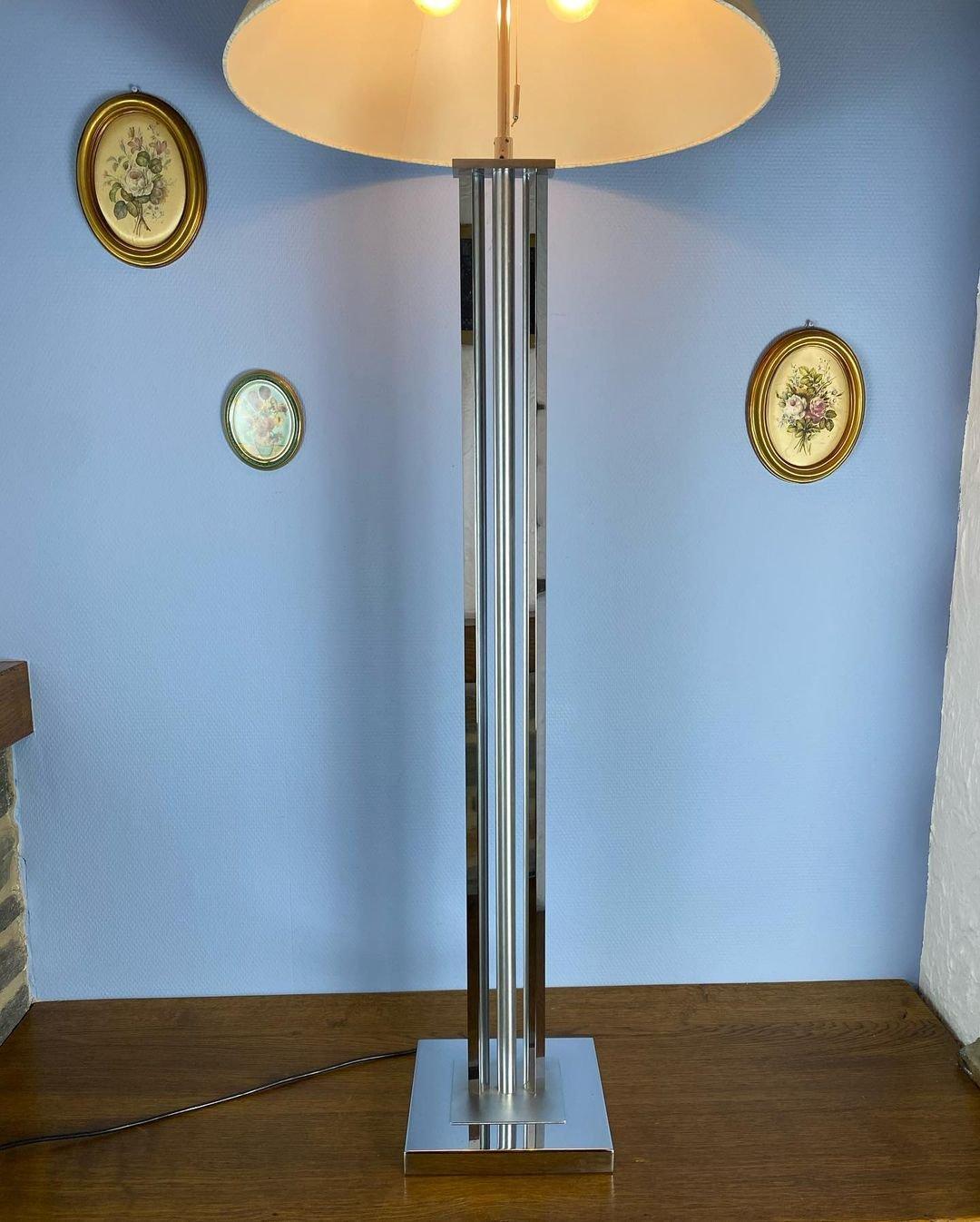 Vintage Floor Lamp, 1970s

The classic floor lamp is created for zoned lighting in apartments in different styles. The design is made of chrome-plated metal, which is combined with any shades in the interior. The design of the luminaire is a wide