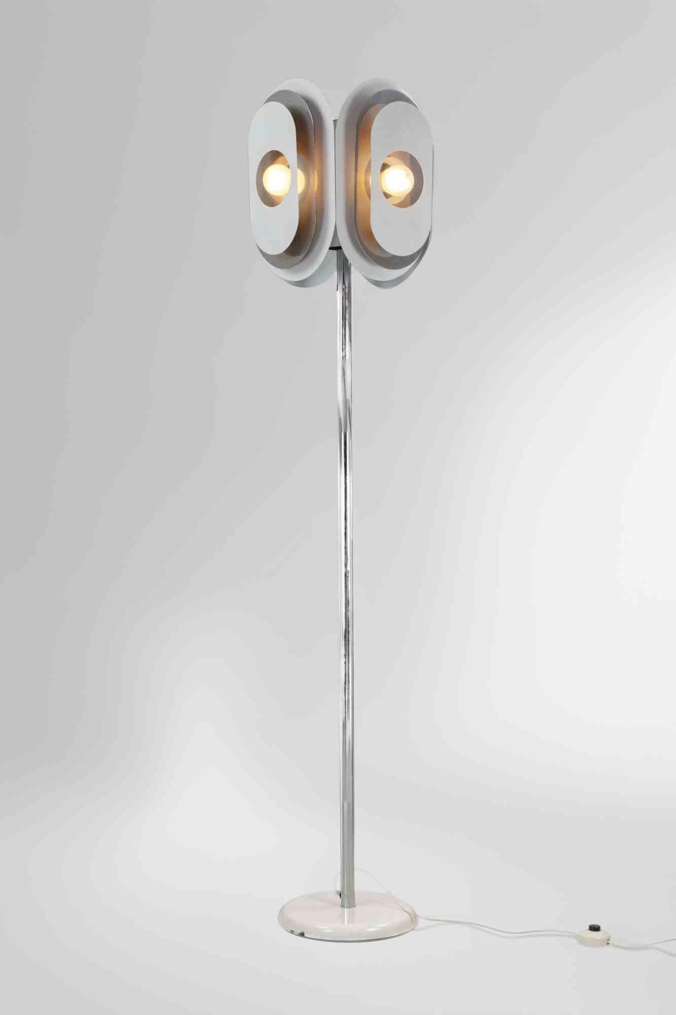Lampada da terra vintage di produzione italiana degli anni '70, in metallo cromato e vetro.

Ottime condizioni.