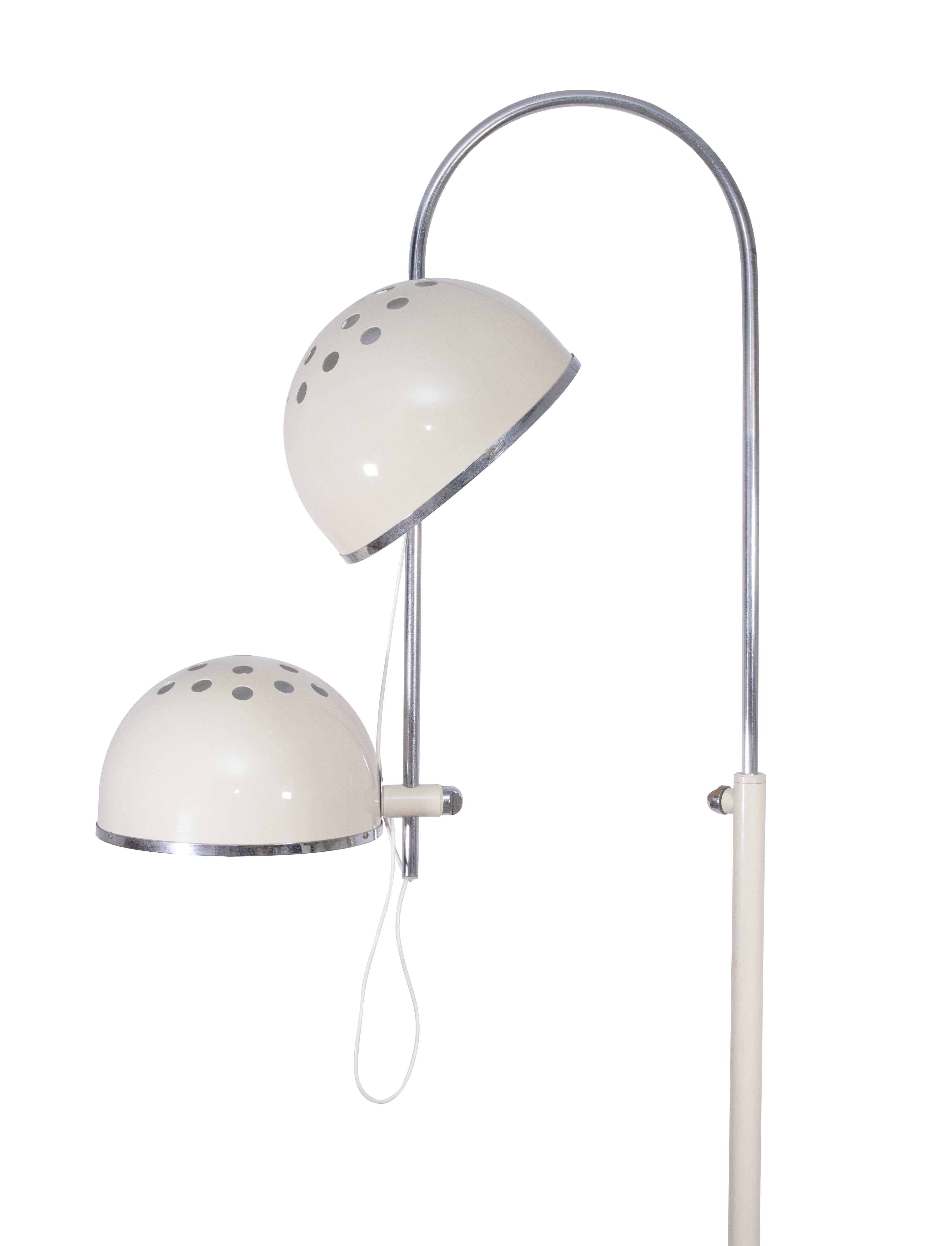 Vintage floor lamp is a design item realized by Italian Production in 1960s.

Iron, Steel and Glass.

Pair of 2 adjustable lights, lampshade with glass plate, adjustable rod.

Dimensions: H 150/240, D 70 cm. Base 40 cm. Lamp 30 cm.
