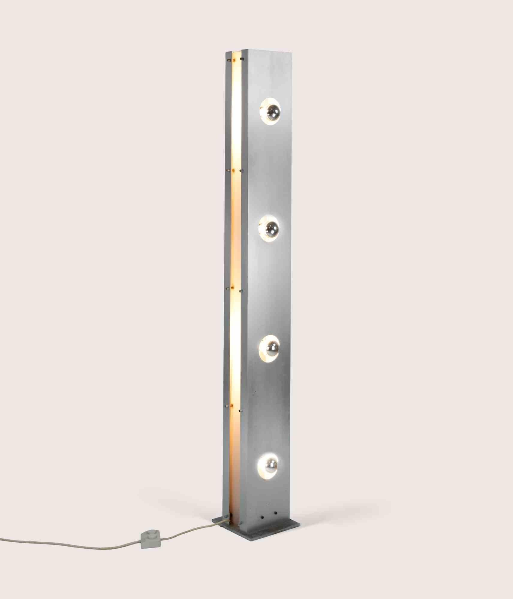 Vintage Lamp with 4 lights in brushed steel, italian production 1970s.

Base 21x21 cm.

Very good condition.