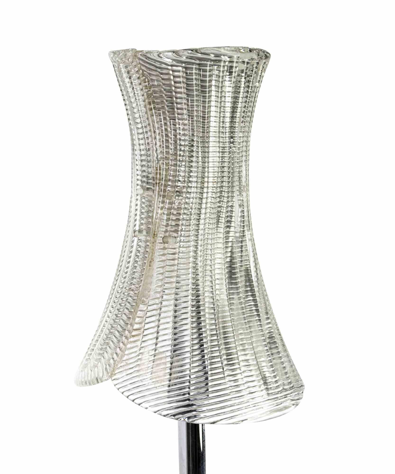Vintage floor lamp is an original design lamp realized in the 1970s in Italy.

A vintage lamp realized in Murano glass and Metal.

Give a touch of elegance to your home with this beautiful lamp!
 