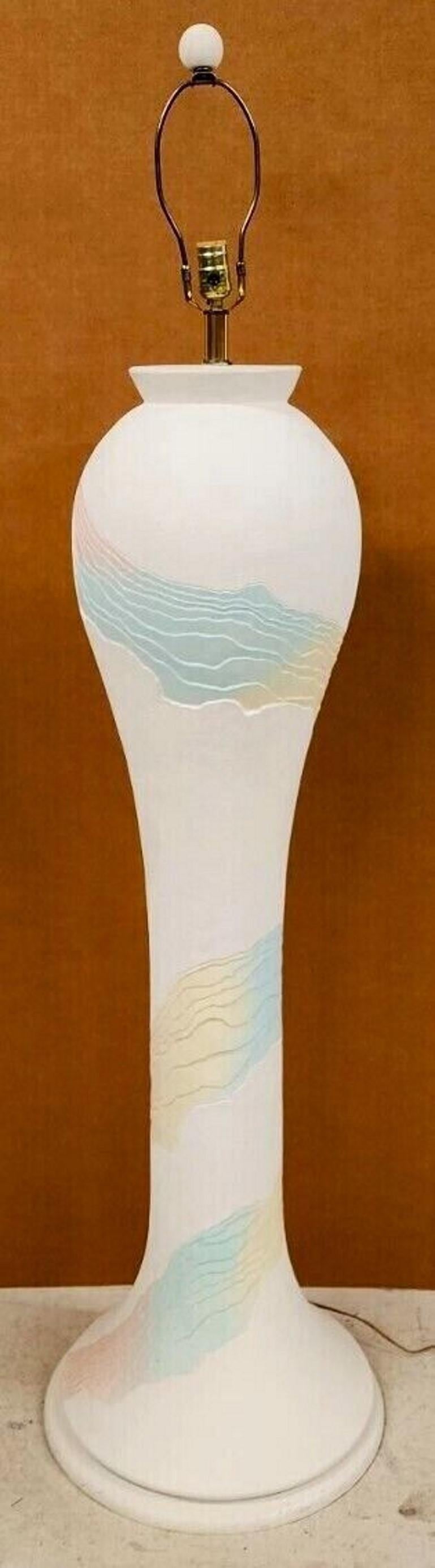 For FULL item description click on CONTINUE READING at the bottom of this page.

Offering One Of Our Recent Palm Beach Estate Fine Lighting Acquisitions Of A
Pair of 1970's Southwestern Style Ceramic/Plaster Floor Lamp Signed LEE REYNOLDS