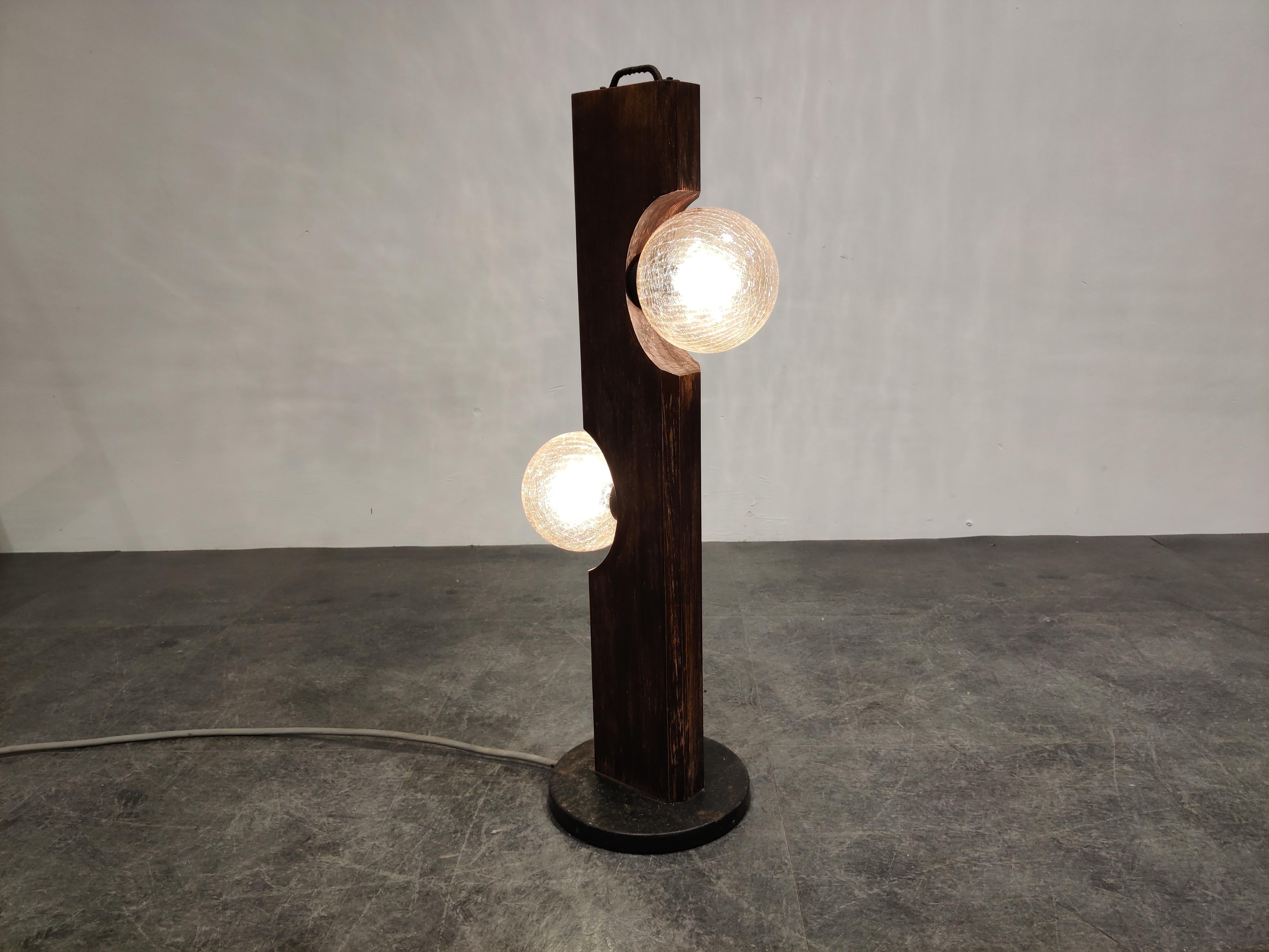 Midcentury floor or table lamp made from maple wood and amber colored glass globes.

Manufactured by Temde Leuchten.

Good condition.

Tested and ready for use with regular E14 light bulbs,

1960s,