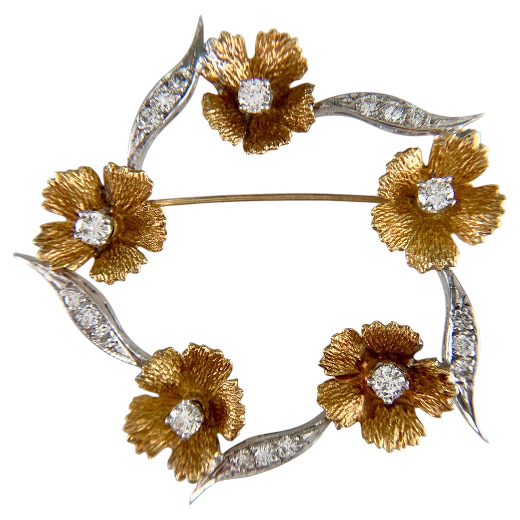 Broche florale vintage en or bicolore 18k avec diamants