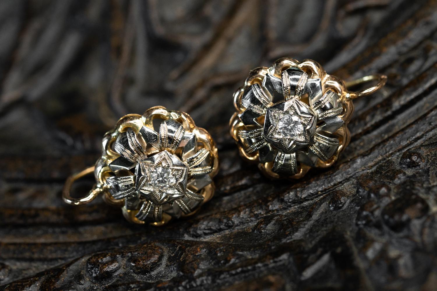A gorgeous vintage pair of statement earrings solid 14k gold earrings. These floral diamond earrings are crafted in bi-color white and yellow gold and measure whooping 2.1 cm in diameter (0.8 inch).

These vintage 1960s earrings originate in Italy,