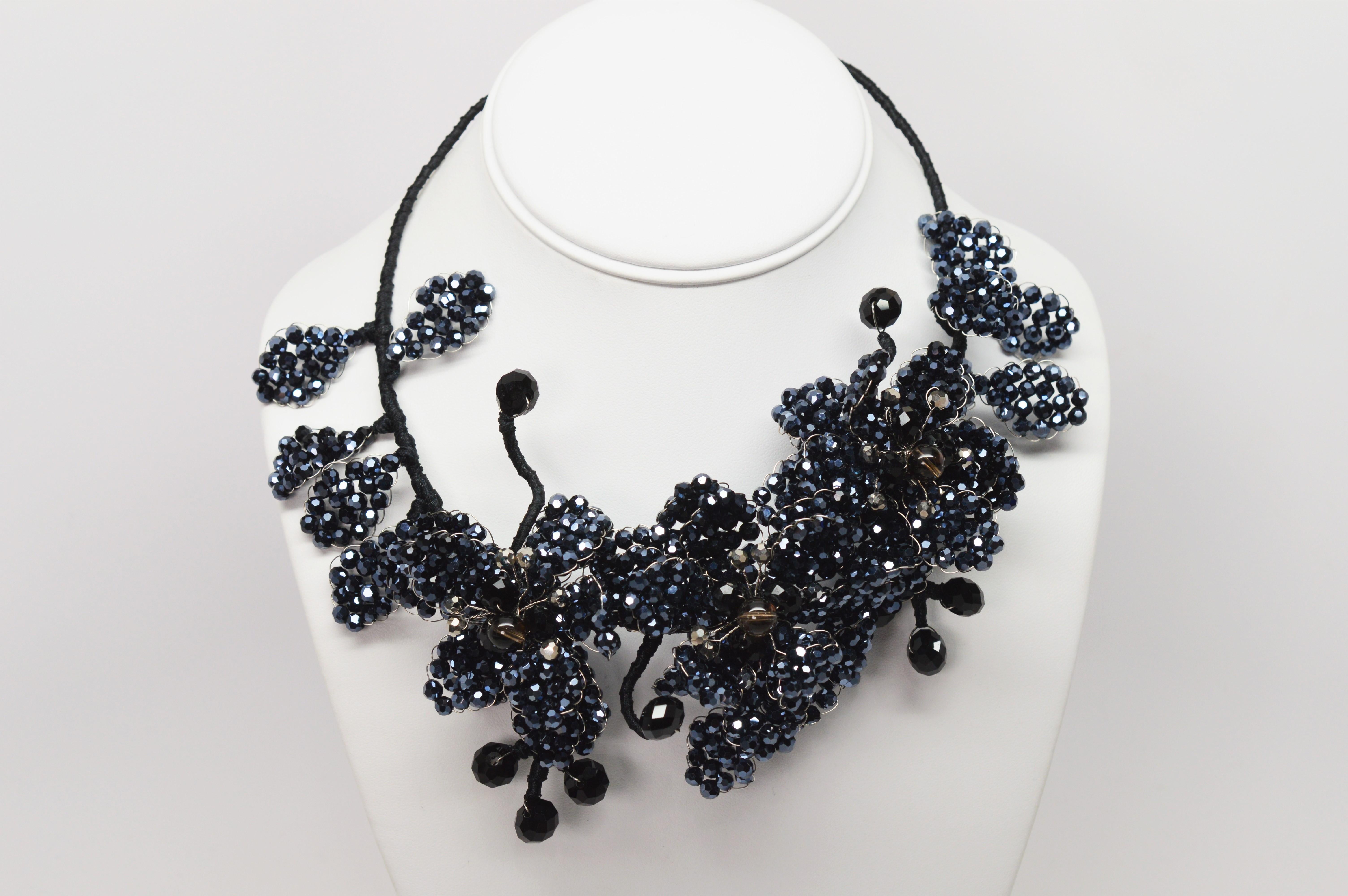 Have fun with this vintage blue black onyx beaded collar statement necklace handcrafted on silk wrapped adjustable wire to wear as a bib necklace or closer and higher on the neck as a choker necklace.  The front focal point of this piece bordering