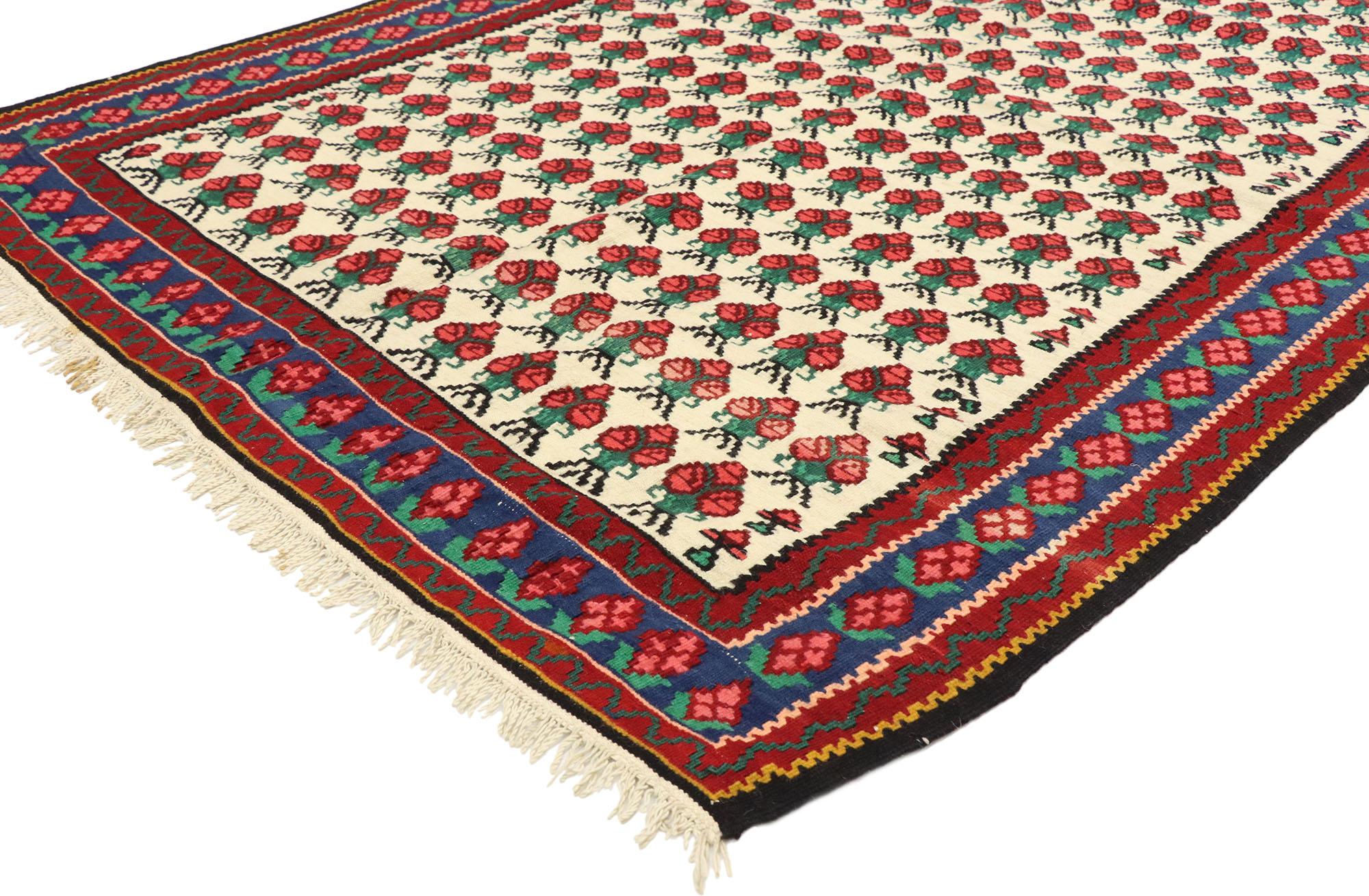 72143, vintage floral Persian Kilim rug with Americana style. With rustic charm and timeless appeal, this handwoven wool vintage Persian floral Kilim accent rug can beautifully blend modern, traditional and contemporary interiors. Cherry red