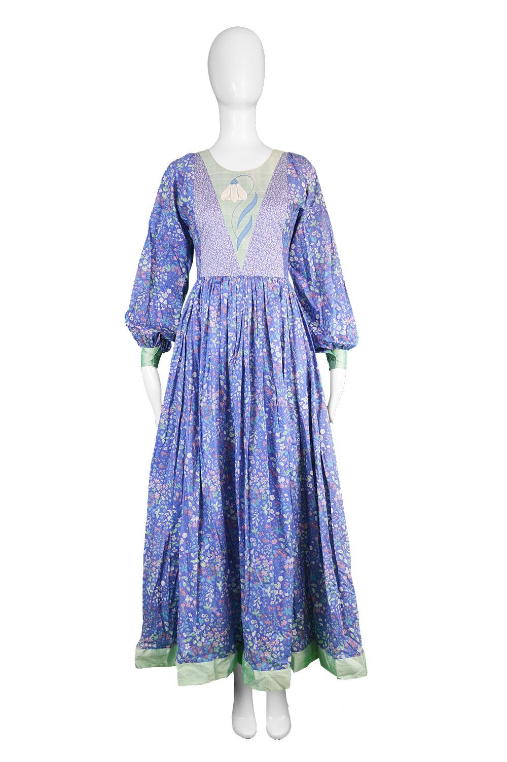 Vintage Floral Print Cotton & Green Silk Shantung Patchwork Maxi Dress, 1970s

Estimated Size: UK 8-10/ US 4-6/ EU 36-38.  Please check measurements & description by clicking 'Continue Reading' below. 
Bust - 34” / 86cm
Waist - 26” / 66cm
Hips -