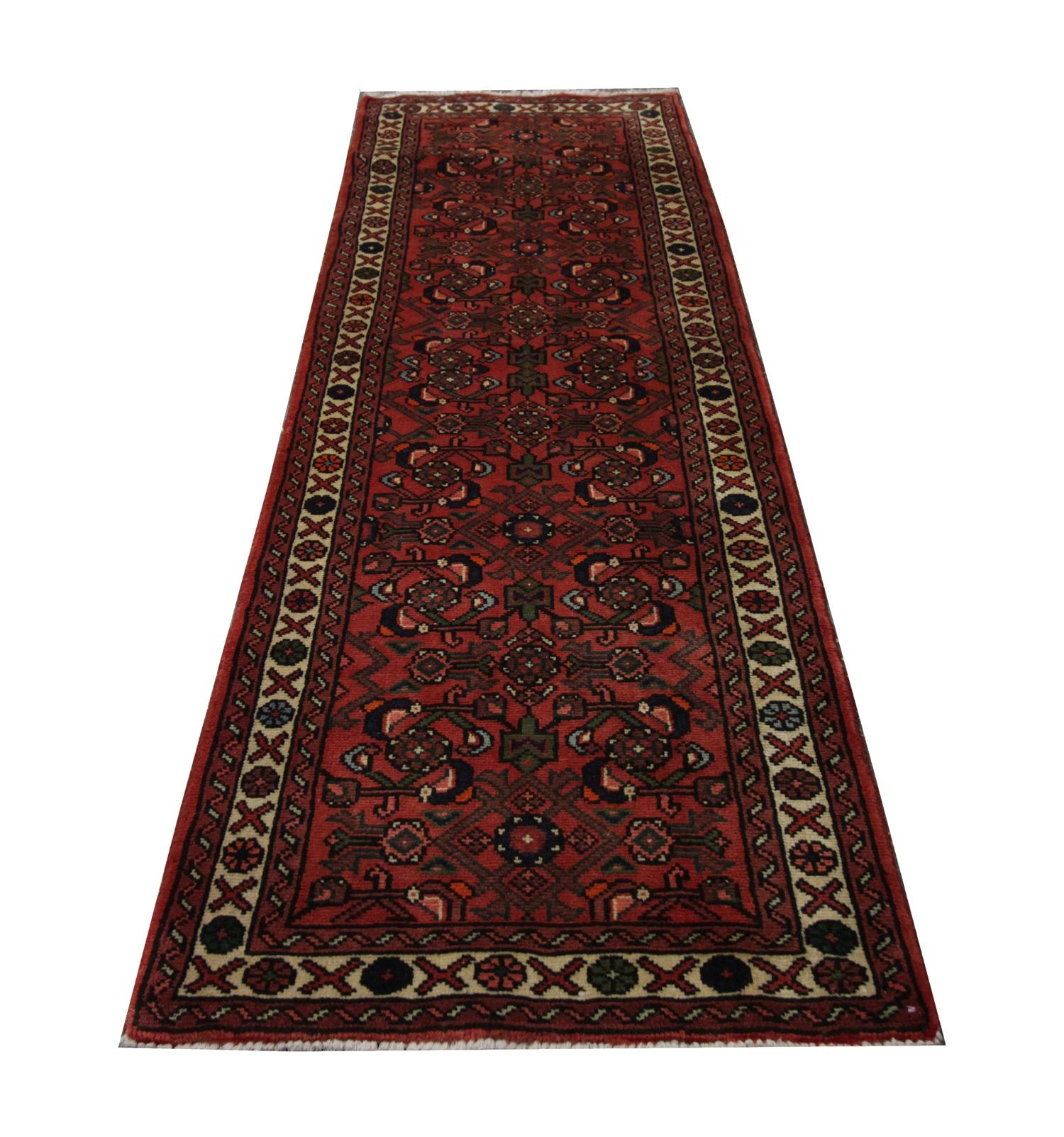 This fine wool runner rug features a bold design with deep red background with a floral design covering the centre. A layered border has then framed this. 
The colour and design in this elegant piece make it the perfect accent accessory for any home