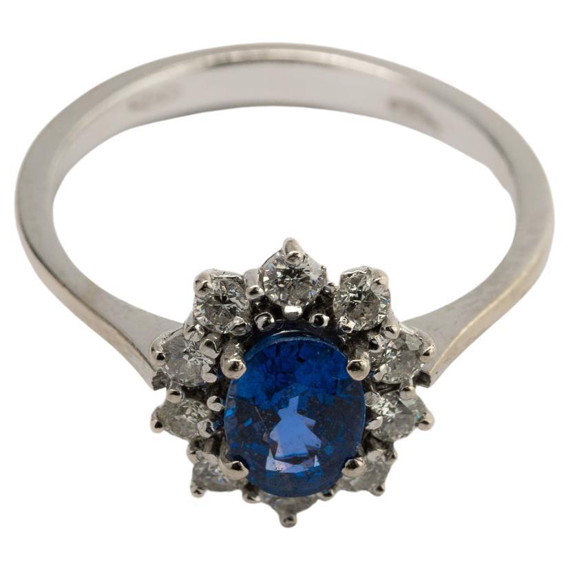 Vintage Oval Sapphire and Diamond Halo Ring, Vintage Sapphire Engagement Ring In Excellent Condition In Rottedam, NL