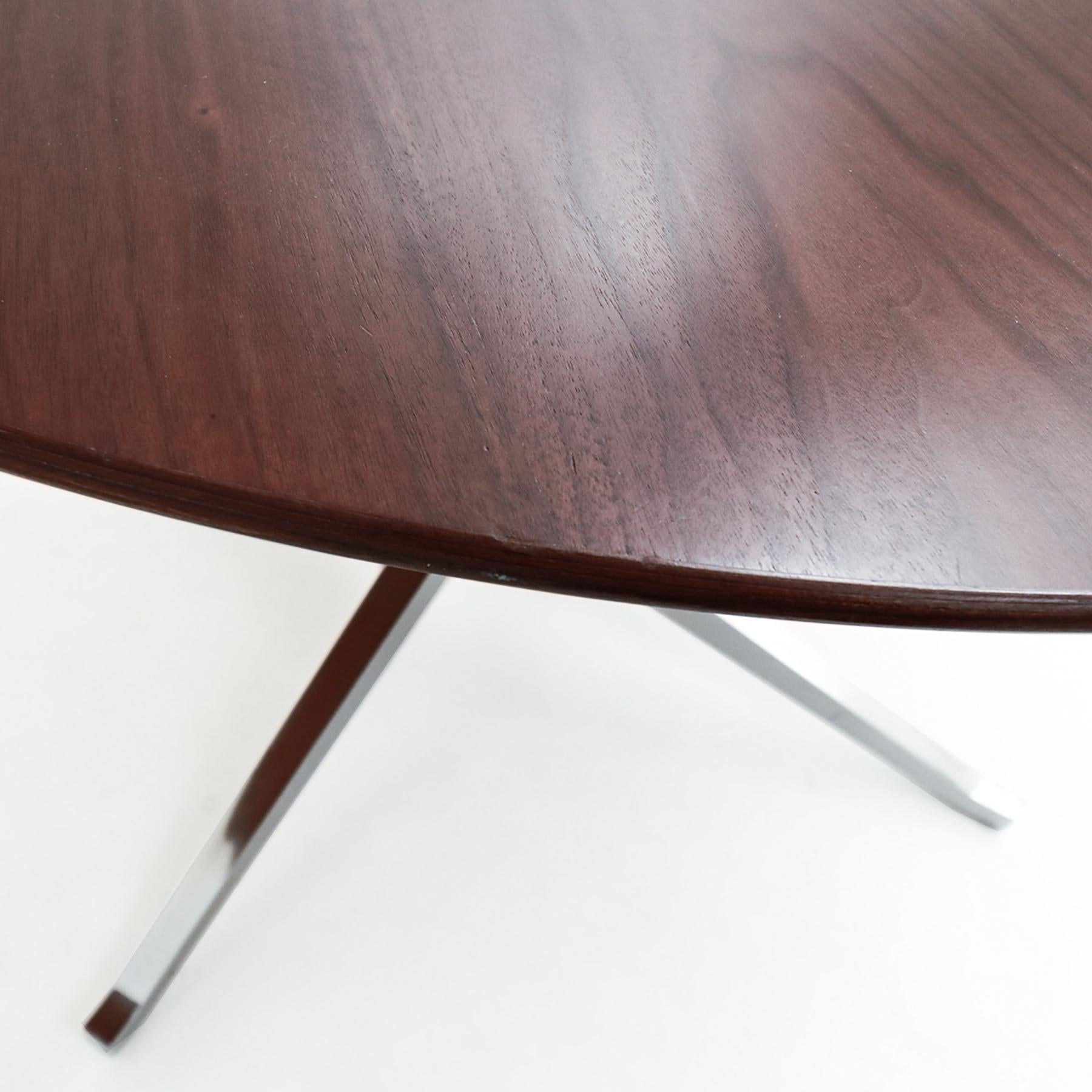 Late 20th Century Vintage Florence Knoll circular Walnut and chrome dining or conference table 