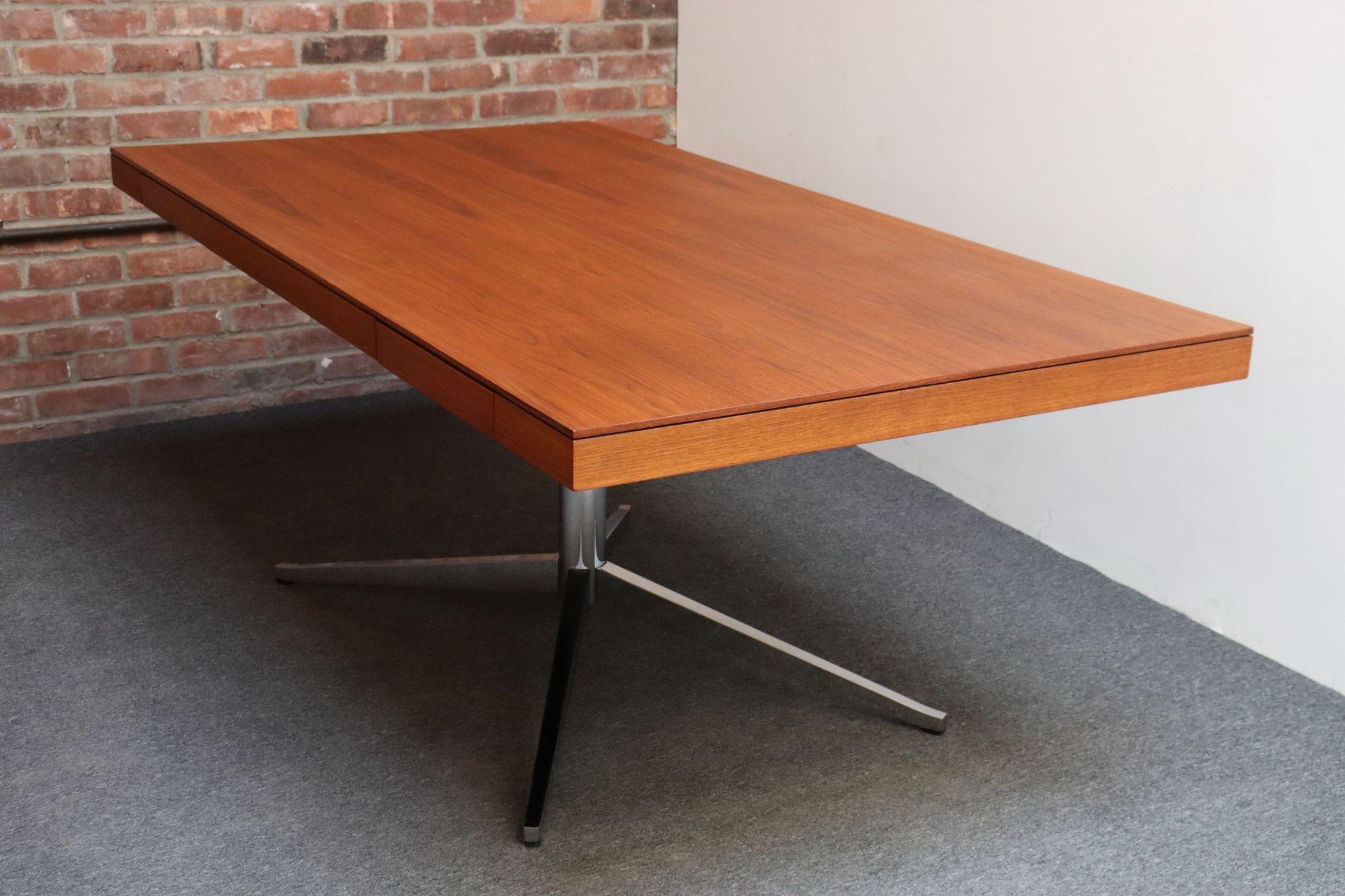This Executive Table/Partners Desk Model 2485D originally designed by Florence Knoll for Knoll Associates in 1961 (this example was executed in 1980) successfully marries form and function with its graceful, elegant appearance with perfect