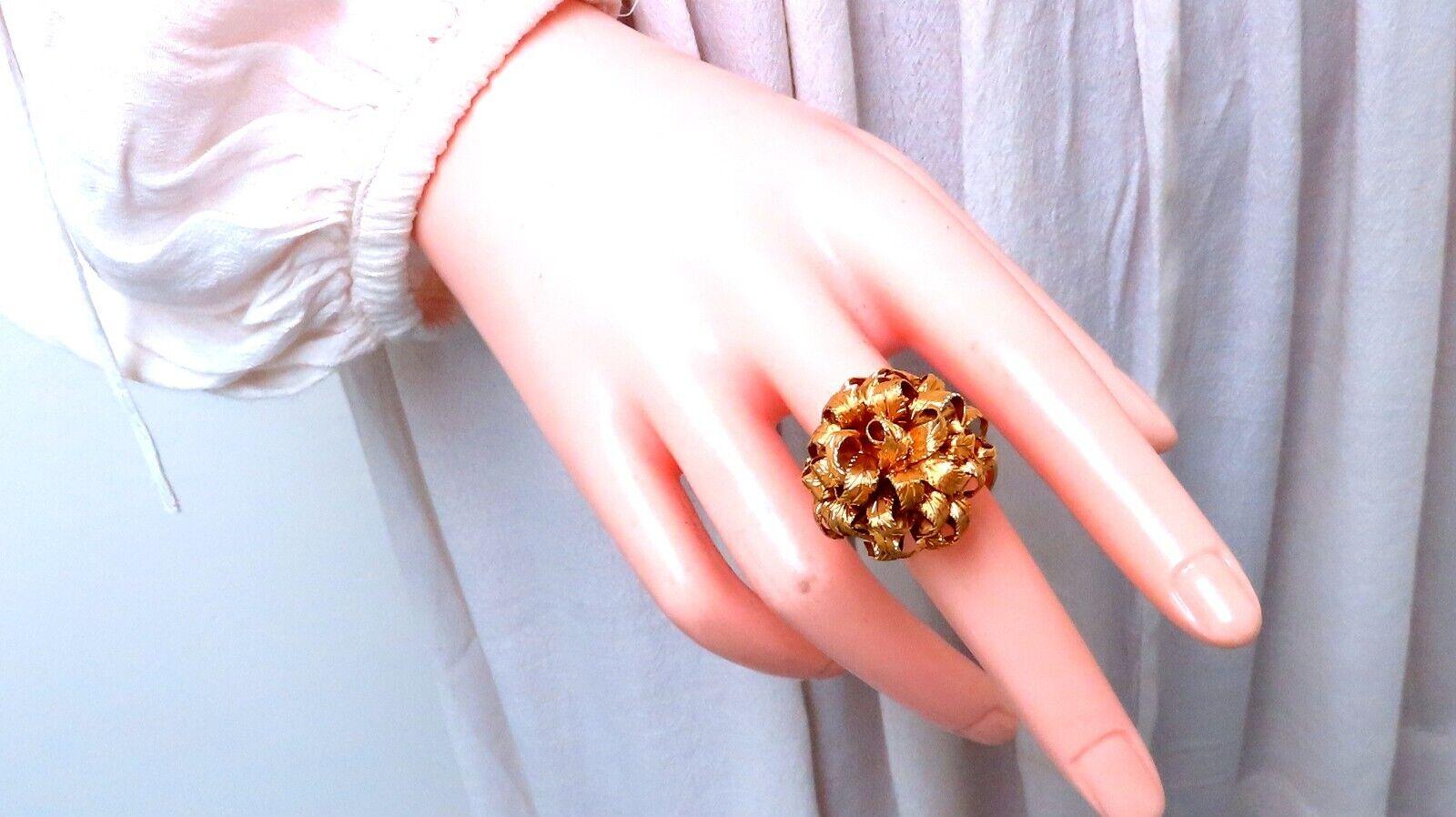 Vintage Florentine Gold Ring.

3D Leaf Patina

25mm wide

16 mm depth

18 karat yellow gold 16.9 grams

Size 7.25