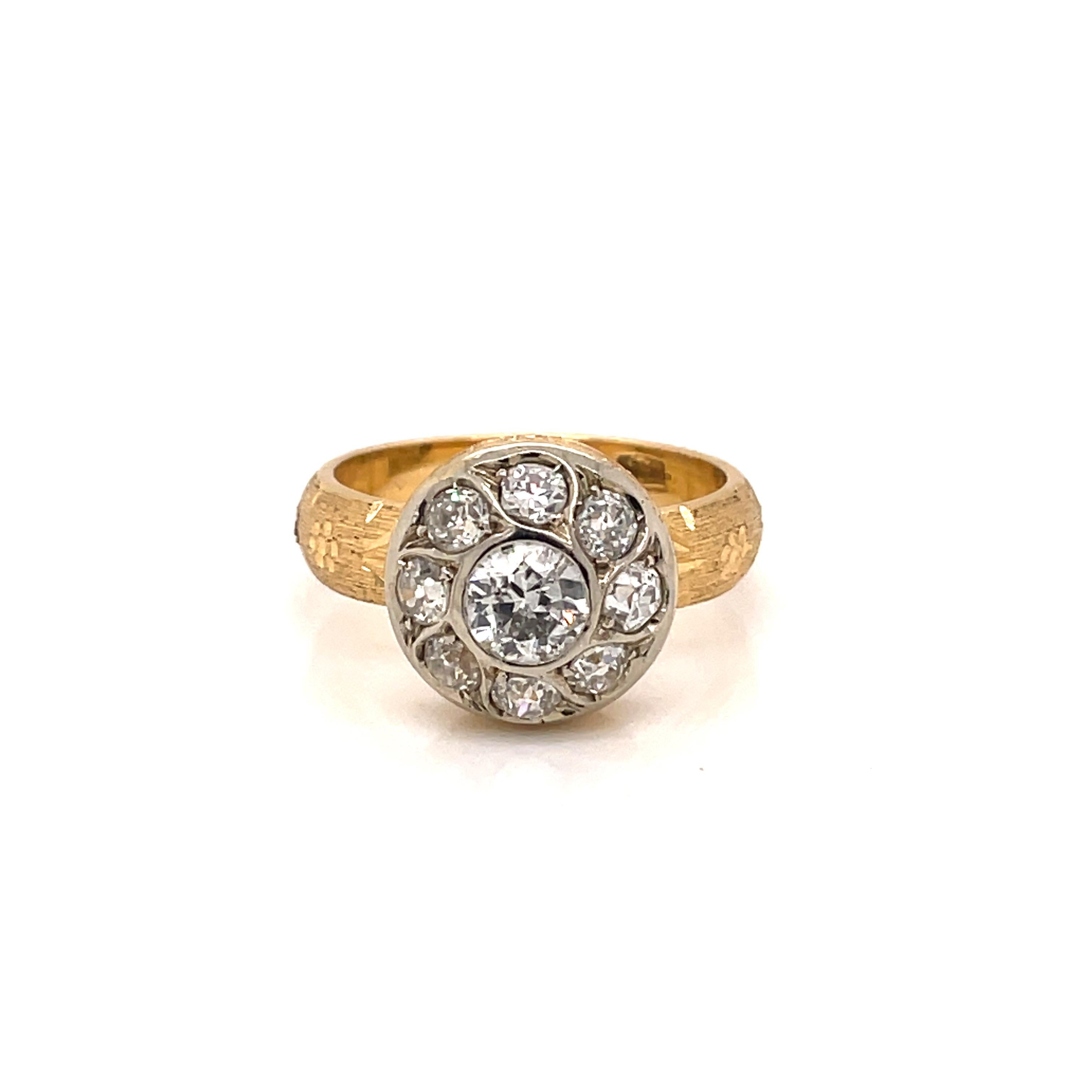 Beautiful Florentine cluster ring, handcrafted in 18k yellow and white Gold, featuring 1.20 carat of colorless European cut diamonds, the engraved band make this ring unique. 