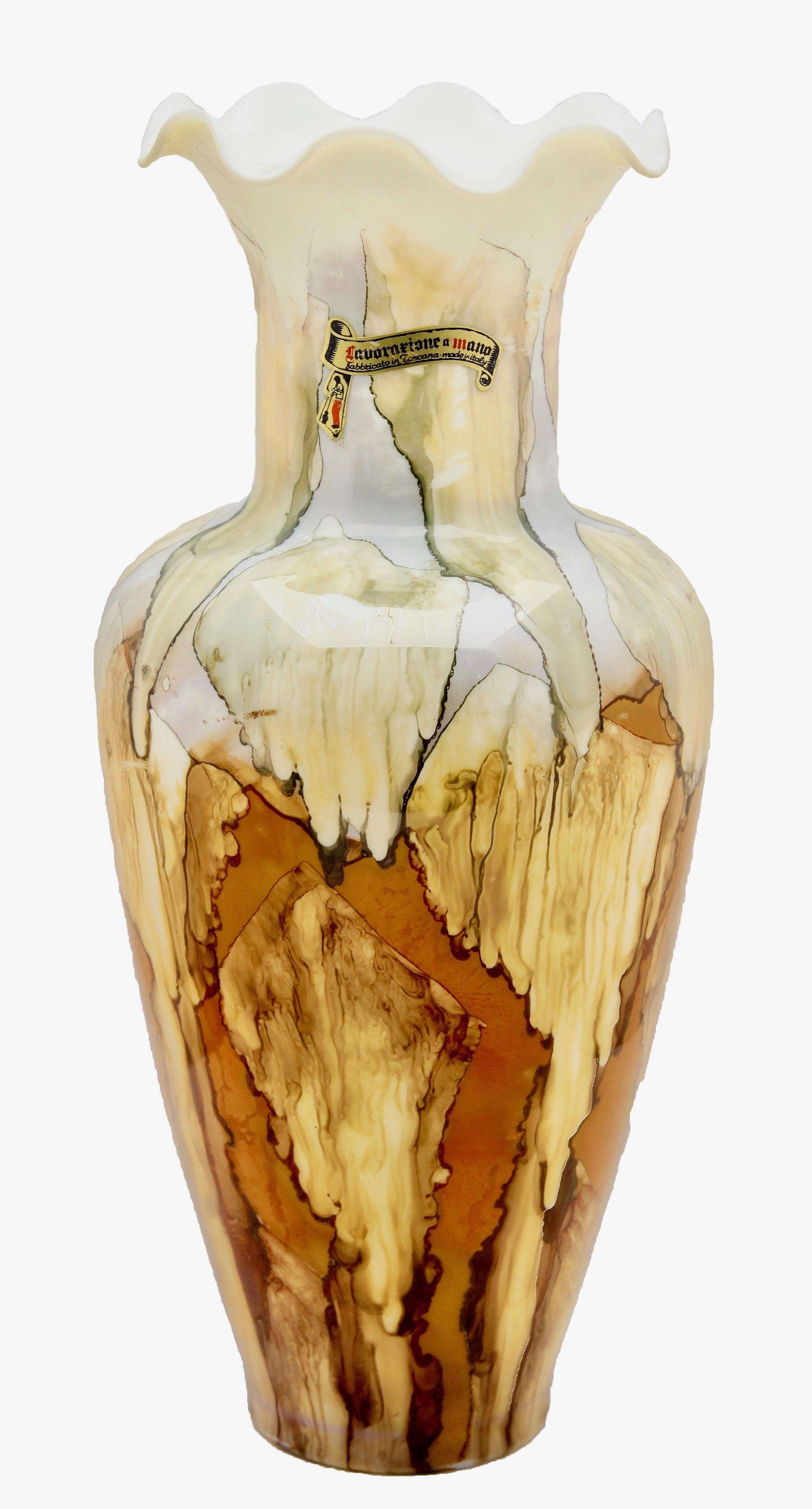 Vintage florentine opaline vase, 1955 with factory label. Created with neutral earthy colors to give an entrancing 3D effect like the walls of a cave.
This is an unusual decorative pattern and color in a large size, a subtle and engaging piece that