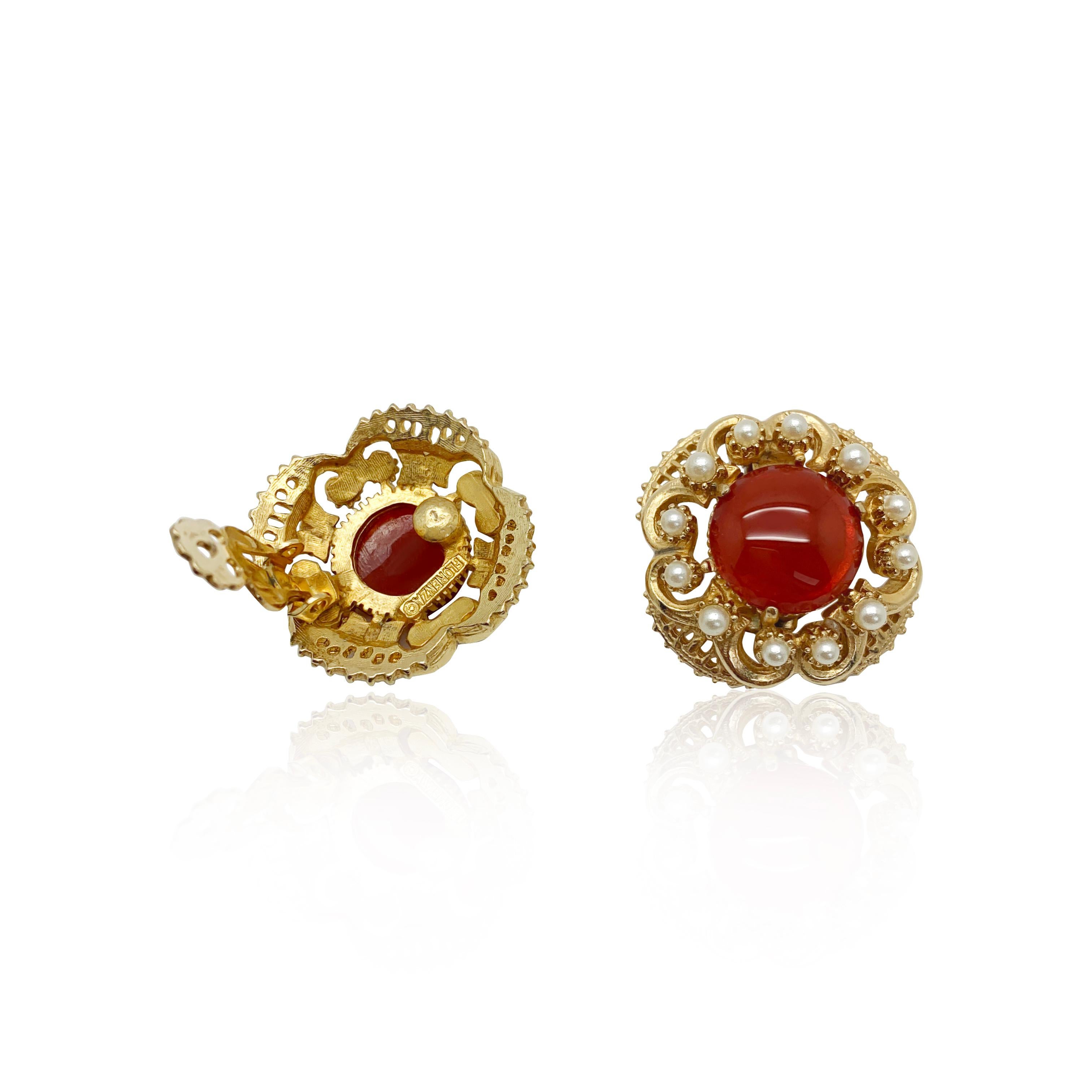 Vintage Florenza Cabochon Earrings. Beautifully made and featuring a large carnelian glass cabochon surrounded by whole faux pearls in a delightfully ornate gold setting. 
Vintage Condition: Very good without damage or noteworthy wear. 
Materials: