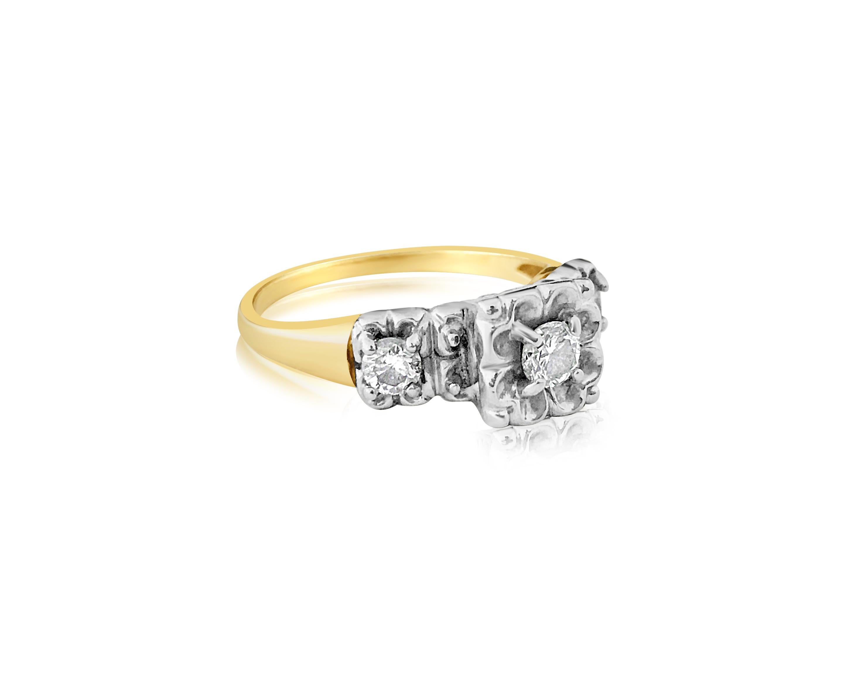 Metal: 14k yellow and white gold, two tone. 

Total carat weight of all diamonds: 0.37 carats. VS clarity and G color. Round brilliant cut diamonds set in prongs. All diamonds are 100% natural earth mined. 

Gorgeous vintage ladies and diamond ring.