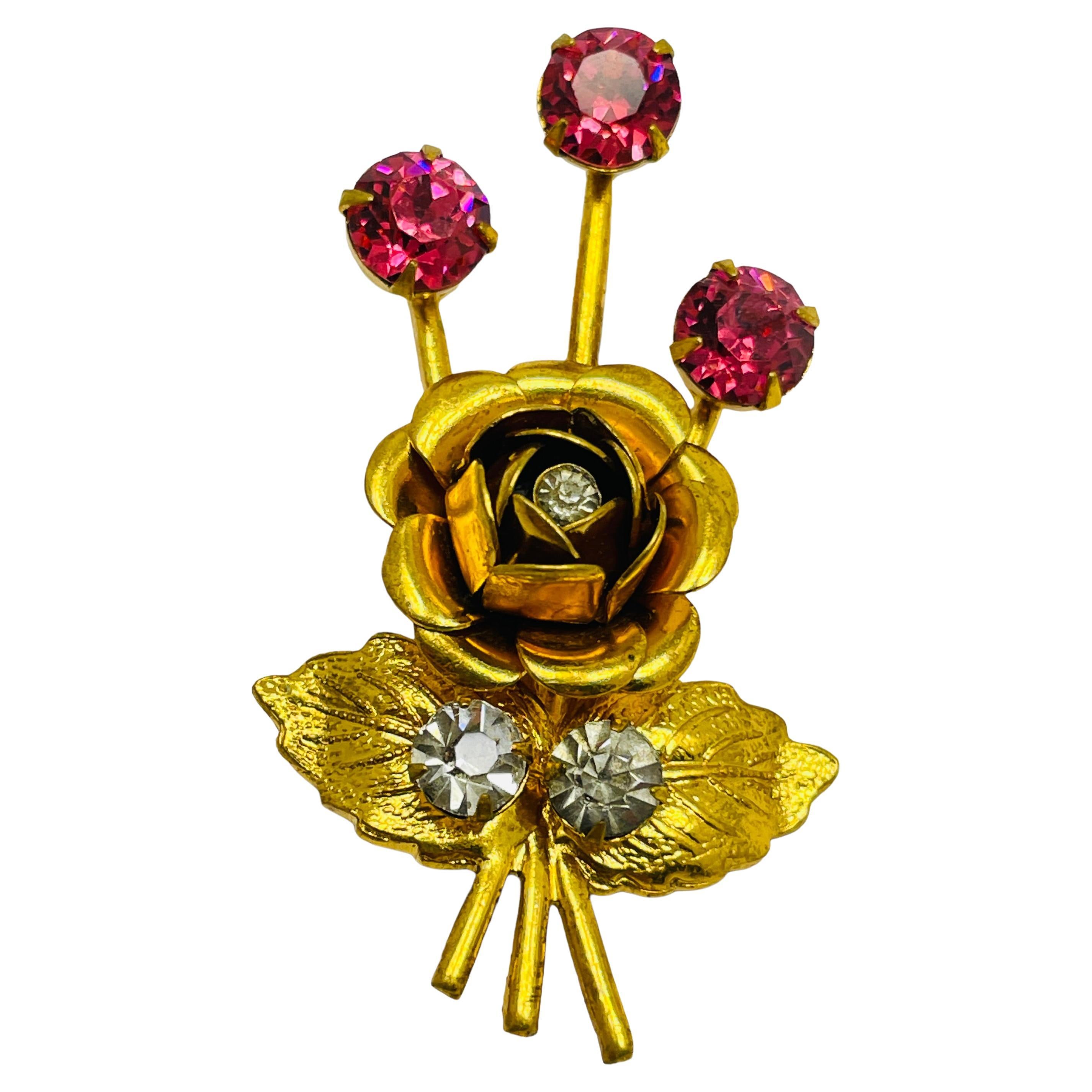 Vintage flower gold rhinestone designer brooch For Sale