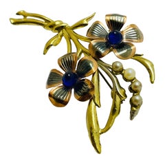 Broche de créatrice vintage fleur en verre perlé de couleur or et argent