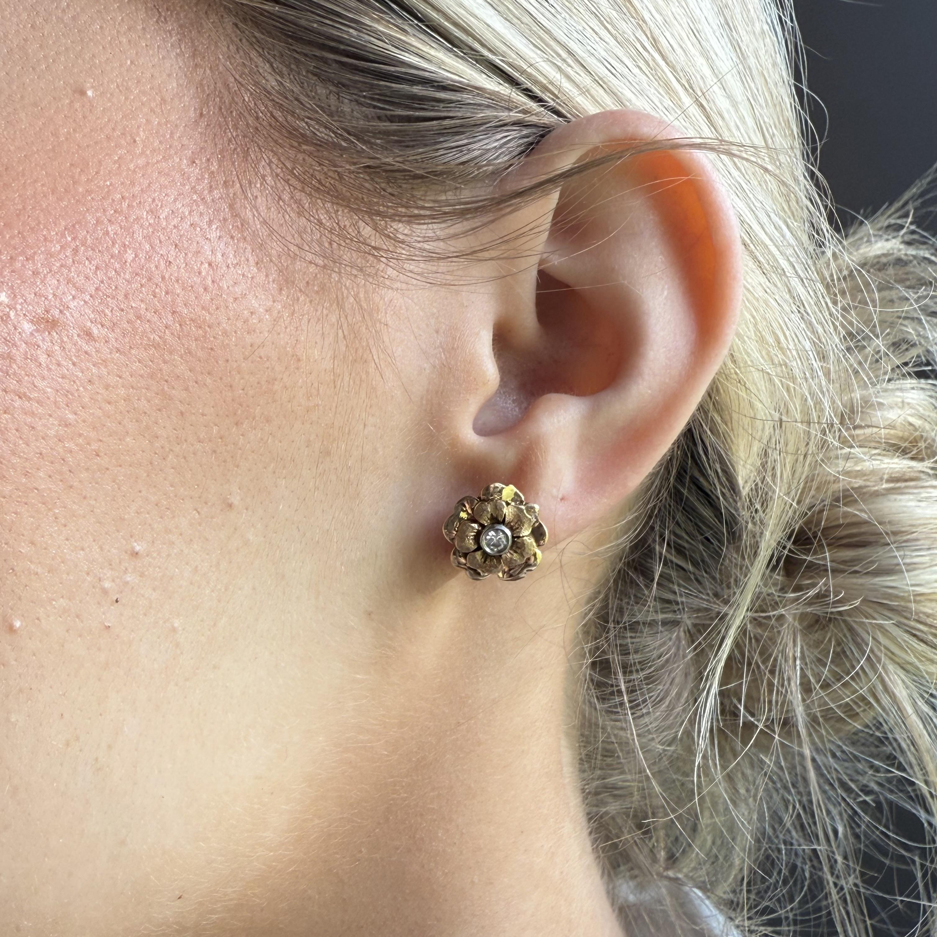We are loving these unique beauties!!

Earring Details
Material: 14K Rose Gold
Back Type: Screw Back
Earring Width: 11.5mm
Weight: 4.8 Grams

Accented by the following gemstones
2 - 3mm Old European Cut Diamonds; GH Color; SI Clarity; Estimated