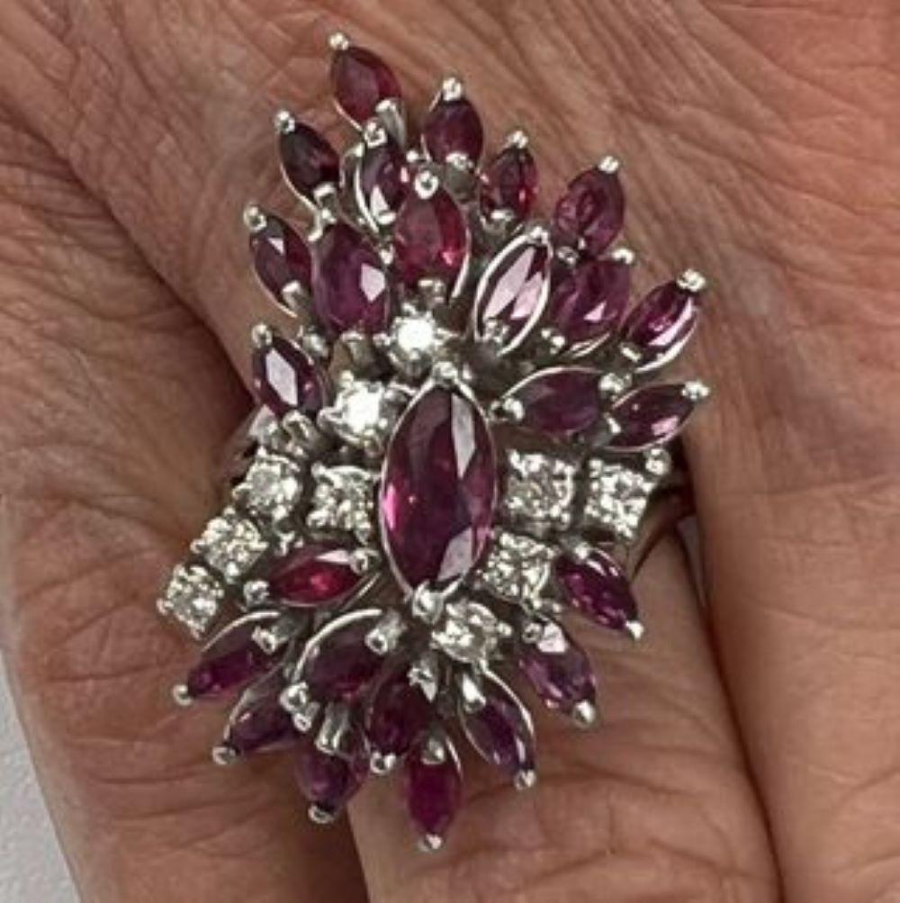 Gorgeous Vintage Flower Ring
One of-a-kind cocktail ring to wear in all the luxurious moments of your life.
Natural Full Brilliant cut Diamonds and Rubies.
14k White Gold
Number of Diamonds: 10 - Total Diamonds Weight: 0.50 Carats
Number of Rubies: