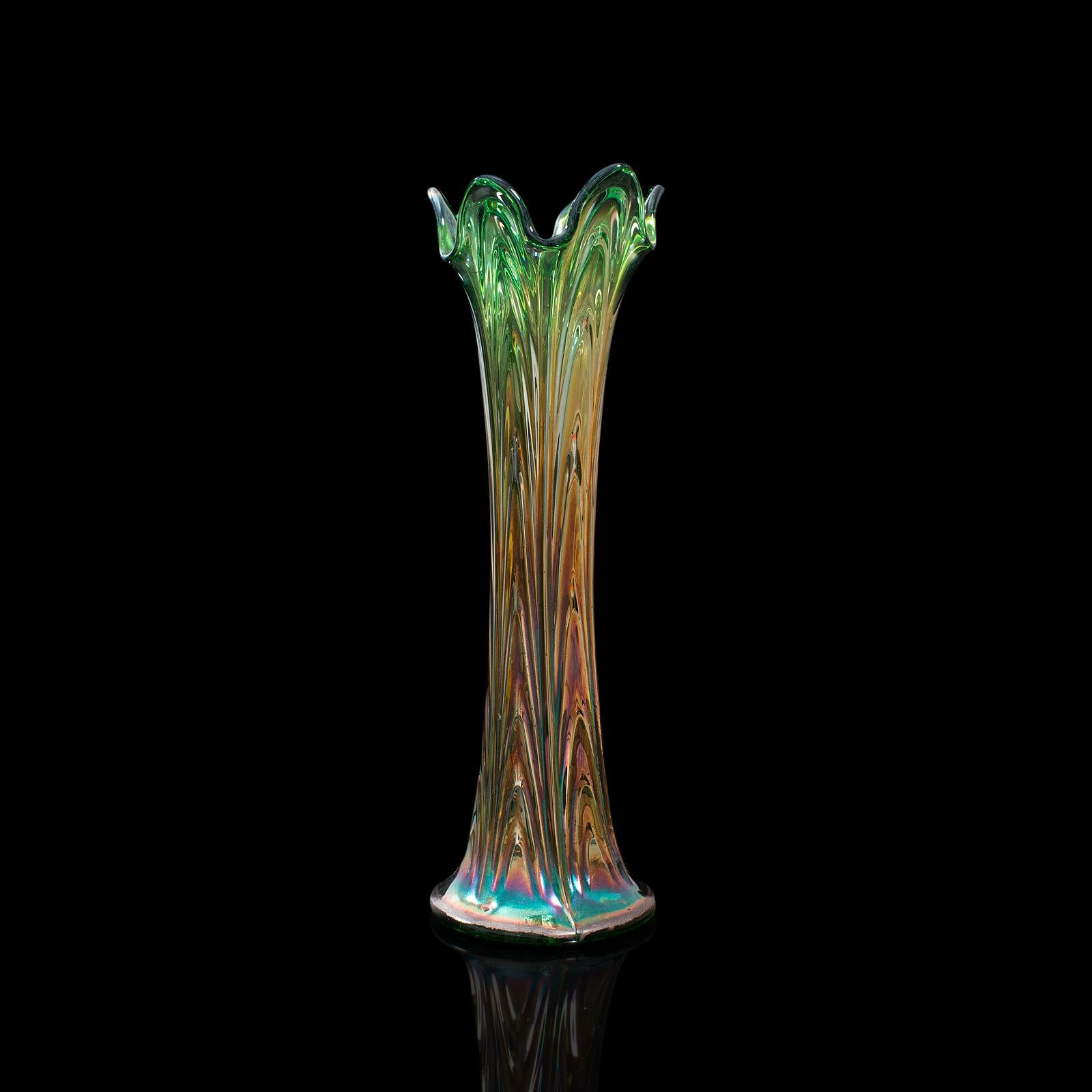 This is a distinctive vintage flower vase. An English, carnival glass fluted vase, dating to the early 20th century, circa 1930.

Attractive example of carnival glass with lighter hues
Displaying a desirable aged patina and in very good