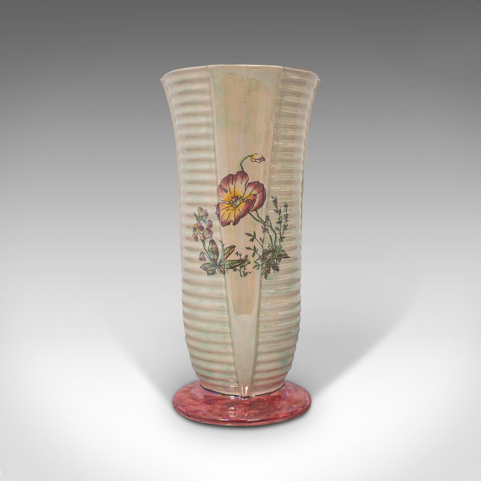 This is a vintage flower vase. An English, ceramic, decorative vase with lustre finish, dating to the mid-20th century, circa 1950.

Fascinating shape with an appealing shimmer
Displaying a desirable aged patina
Ceramic finished in a cream