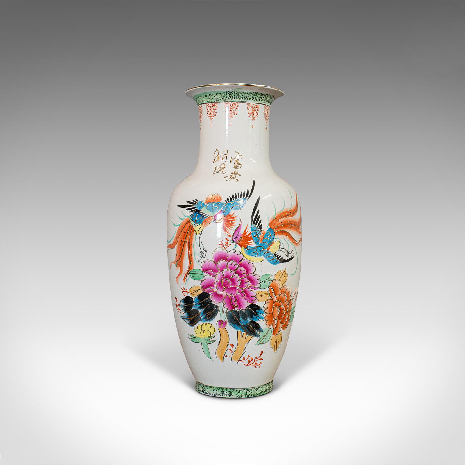 This is a vintage flower vase. An Oriental, ceramic baluster urn in Art Deco taste with bird of paradise motif, dating to the mid-20th century, circa 1940.

Superb color to this decorative vase
Displays a desirable aged patina
Ceramic in good