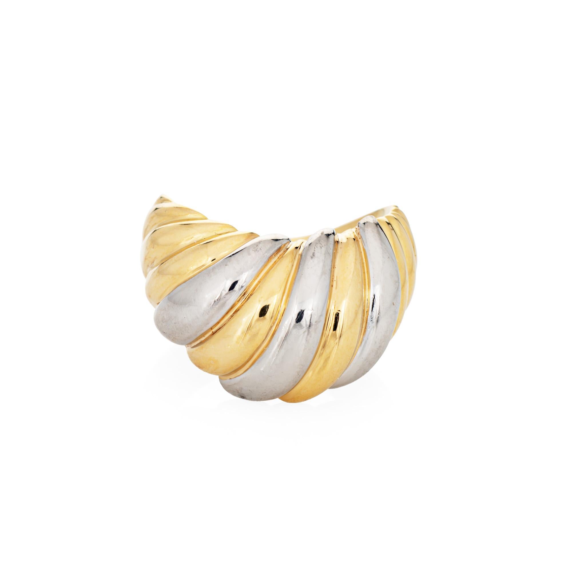 Stylish vintage dome cocktail band, crafted in 18 karat yellow gold and 900 platinum (circa 1990s). 

With an alternating pattern of platinum and yellow gold the band has a low dome rise with a concave design. The ring rises 6mm from the finger
