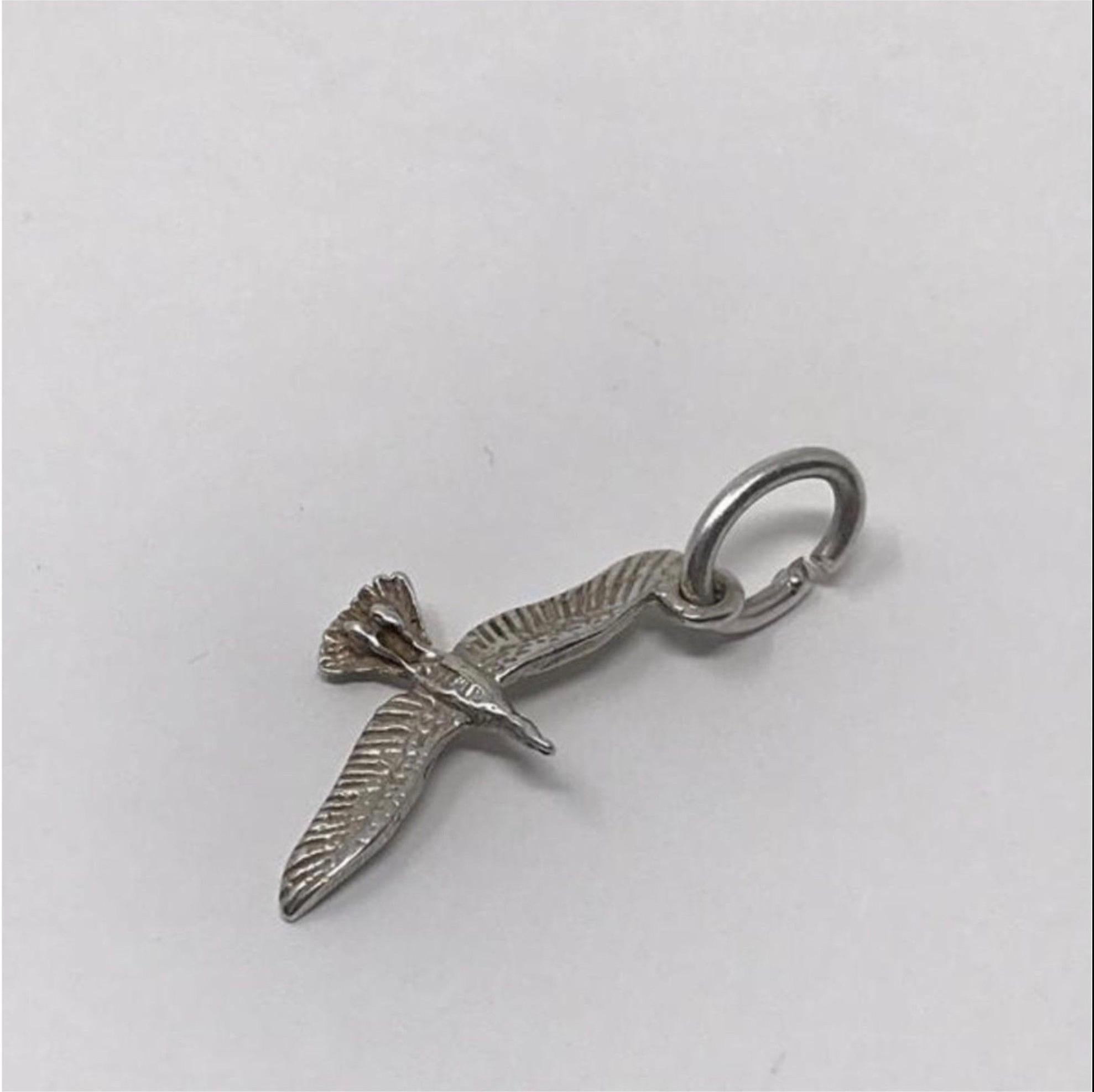 Model - Vintage Flying Bird/Goose Charm/Pendant

Condition - Exceptional

SKU - 1044-13

Original Retail - $25.00

Dimensions - 1 x .5 x .1

Closure Type - Not Applicable

Material - Sterling Silver

Comes with - No Additional