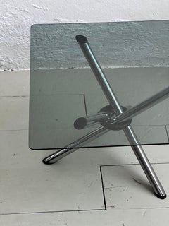 Vintage foldable coffee table, chromed tubular metal and smoked glass
