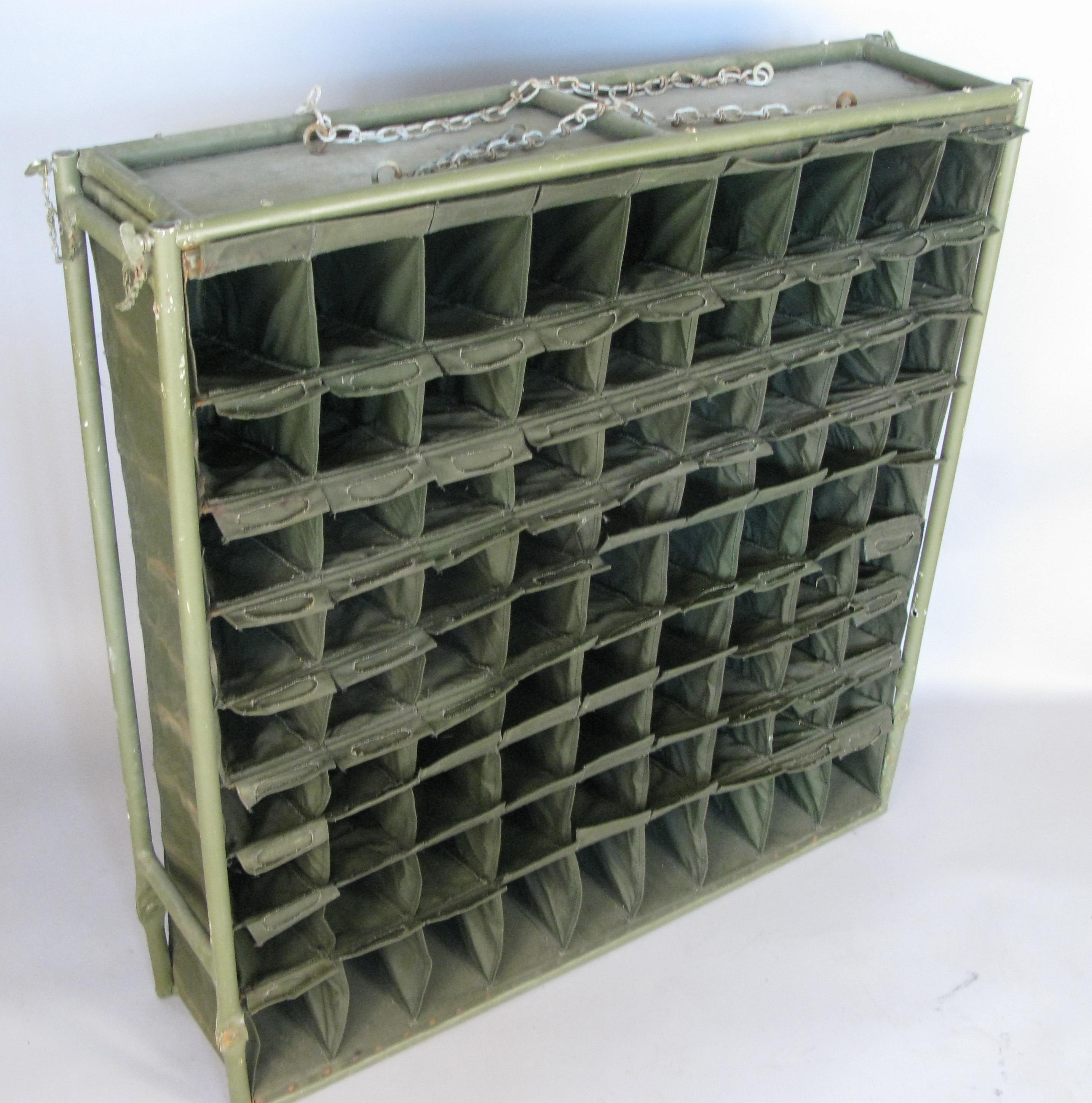 A very cool vintage 1940s folding canvas army mail sorter, designed to be transported and used in the field - mades a terrific and unusual wine rack. Metal frame and canvas centre. Shows age expected wear.