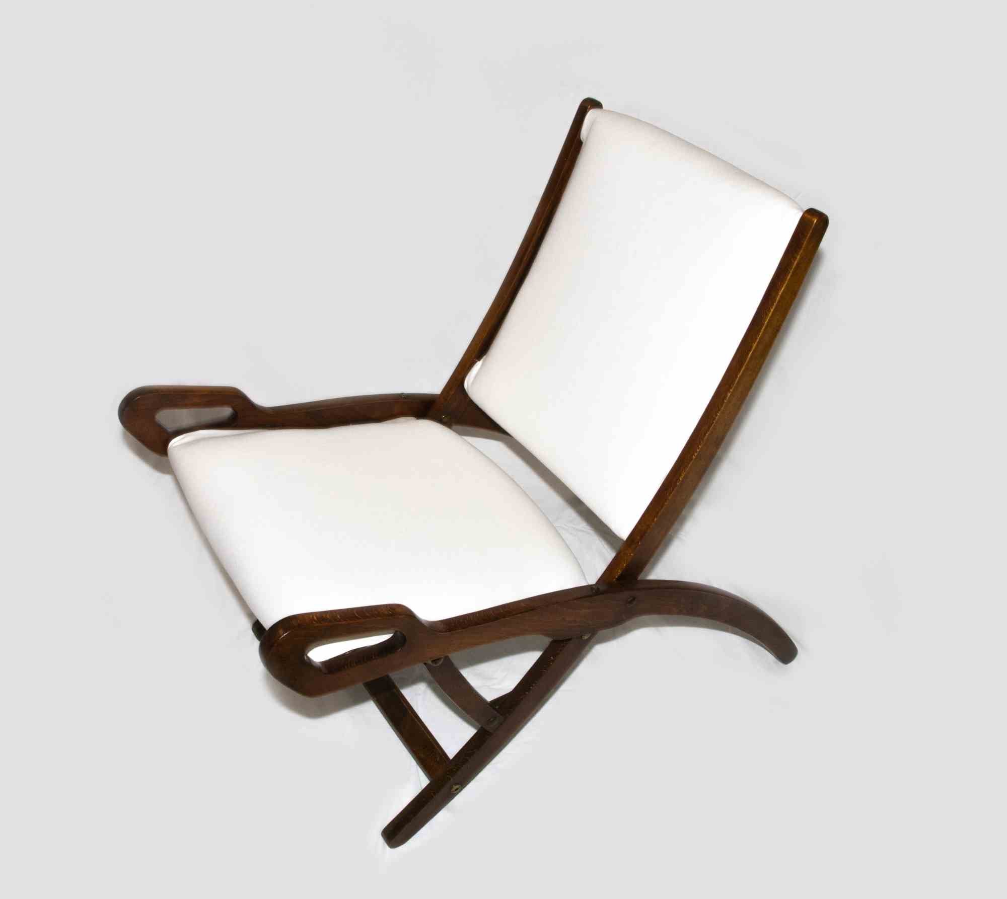 Vintage folding chair Ninfea by Gio Ponti for Reguitti, Italy 1958.

Dimensions: Width 48 cm - Depth 66 cm - Height 71 cm - Seat height 33 cm.

Wood, Brass and Fabric.

Good conditions.

Born in Milan in 1891, Giovanni (Gio) Ponti studied