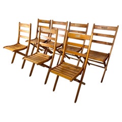 Vintage-Sessel mit klappbaren Lattenrost-Stühlen – 7er-Set