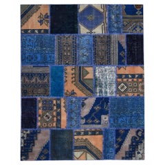 Tapis d'art populaire vintage en laine patchwork à motifs bleus et brun clair 5'6''x7'