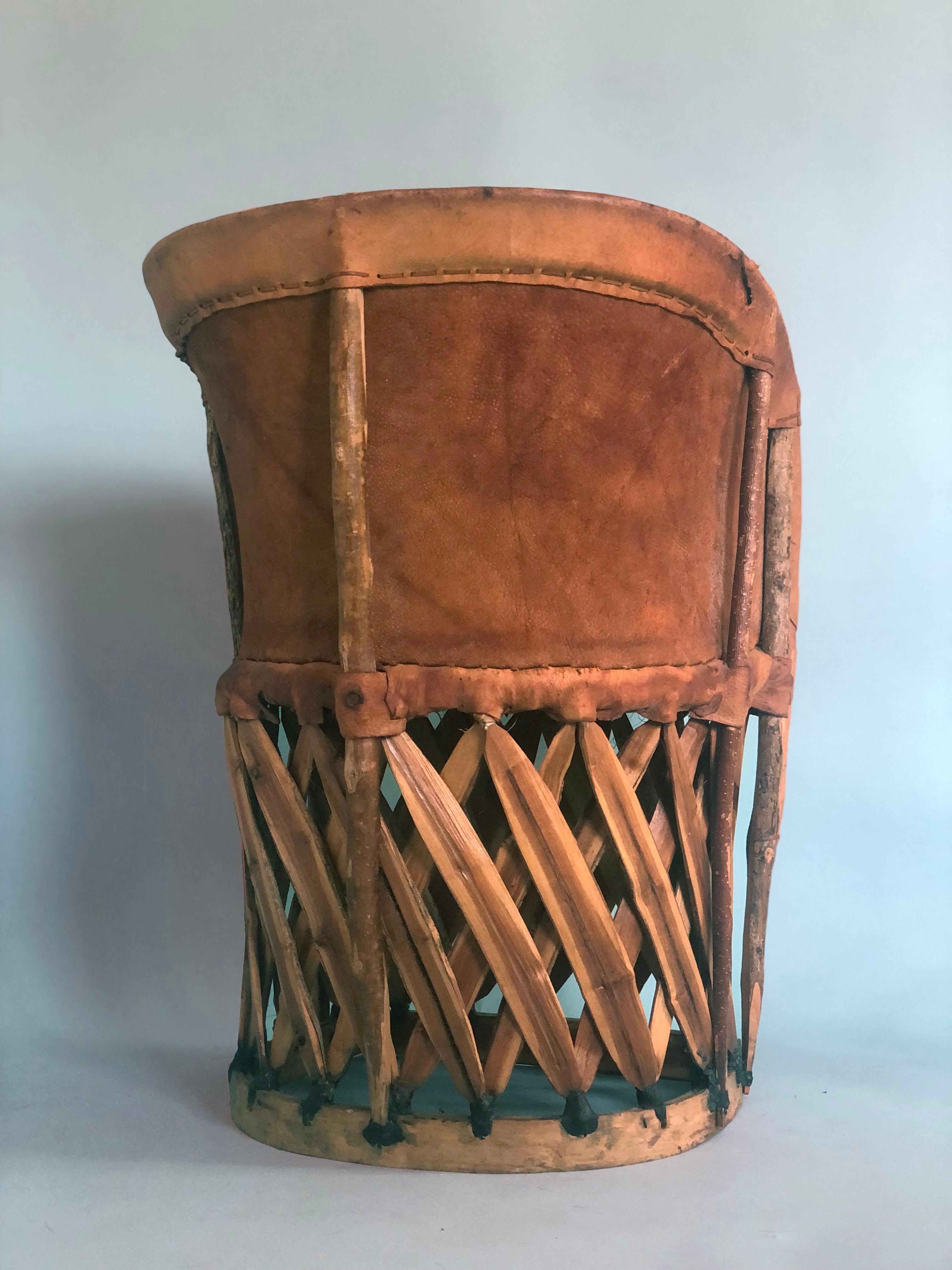 An unique Folk Art leather chair from Equipale Mexico, 1970s. Exotic woven wooden frame covered with ostrich leather. 
These chairs are still being made new. This is a vintage one.

Handmade chair In good condition. Mexico, 1970s

Object: