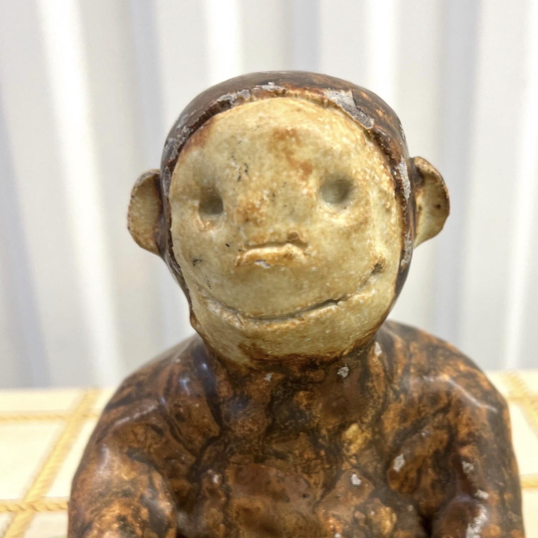 Vintage Folk Art brutalist Monkey sculpture. He is so cute and imperfect which makes him absolutely perfect to me. He is made of sculpted clay. This is a great example of 1960’s folk art.