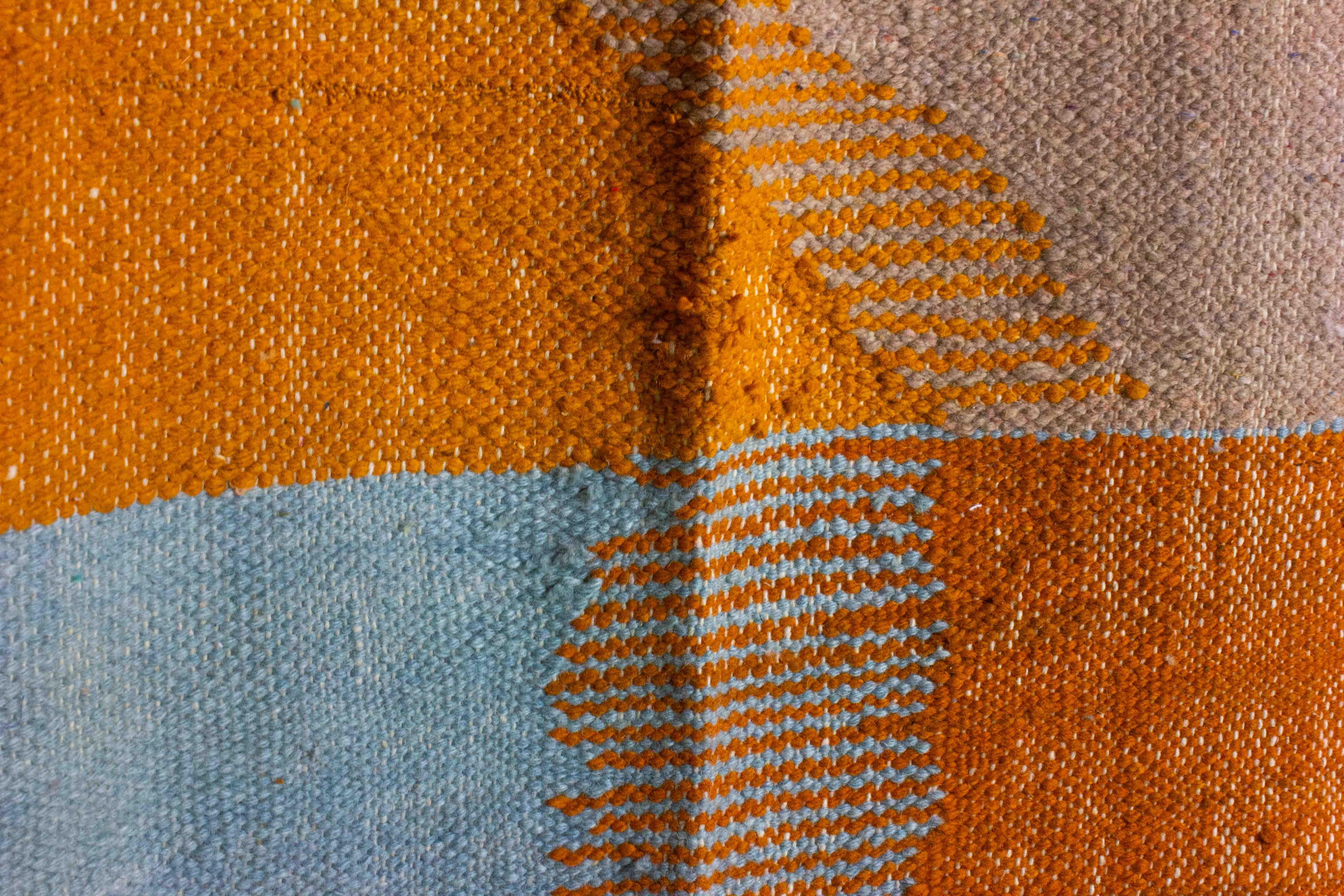 Moroccan Vintage Folk Art wool berber rug with abstract shapes in blue and orange For Sale